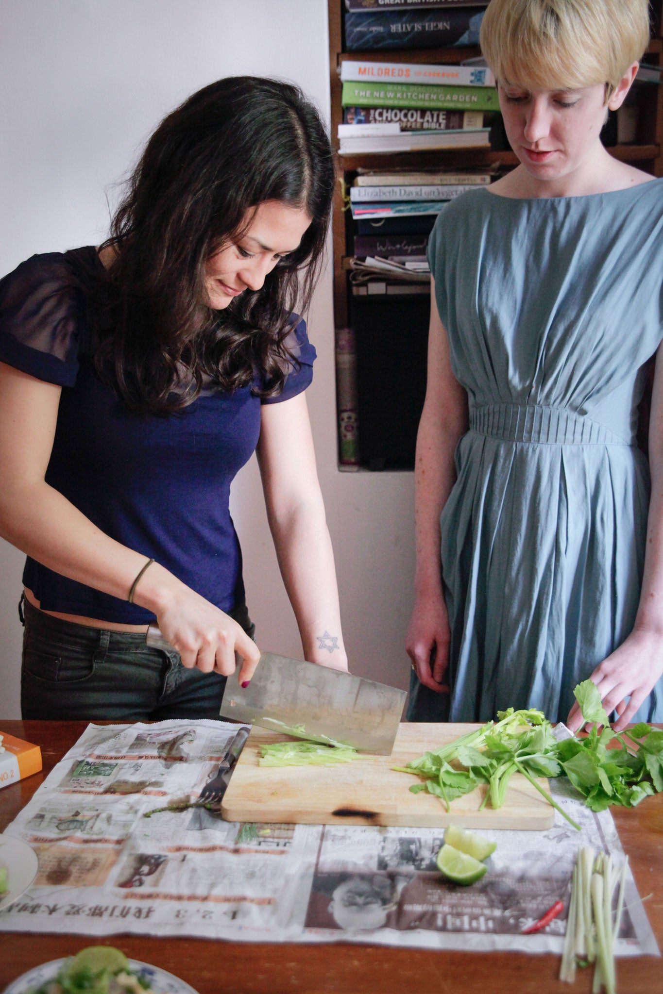 Lizzie Mabbott gives Holly a lesson in using a cleaver