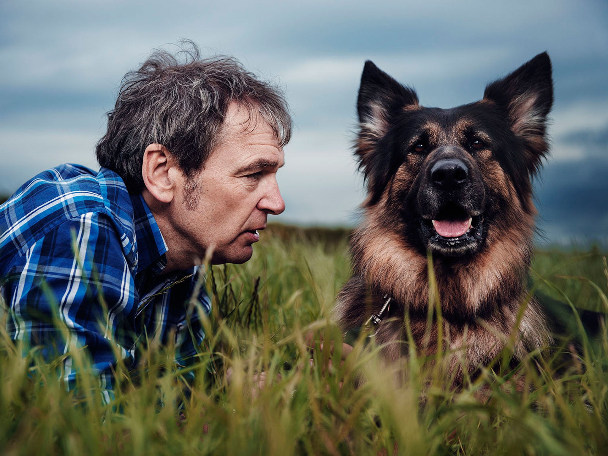 Presenter Mark Evans with a canine companion