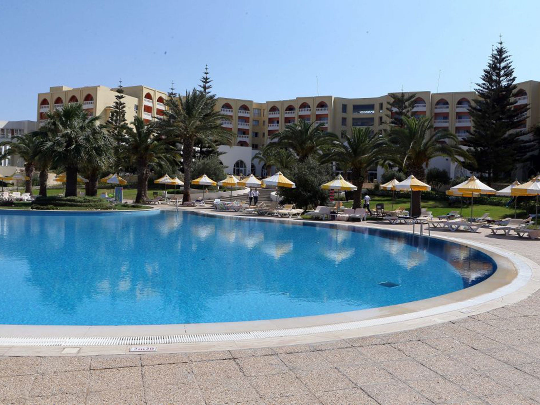 A general view of the deserted pool and deck chairs at the Imperial Marhaba Hotel in the resort town of al-Sousse, a popular tourist destination 140 km south of Tunis