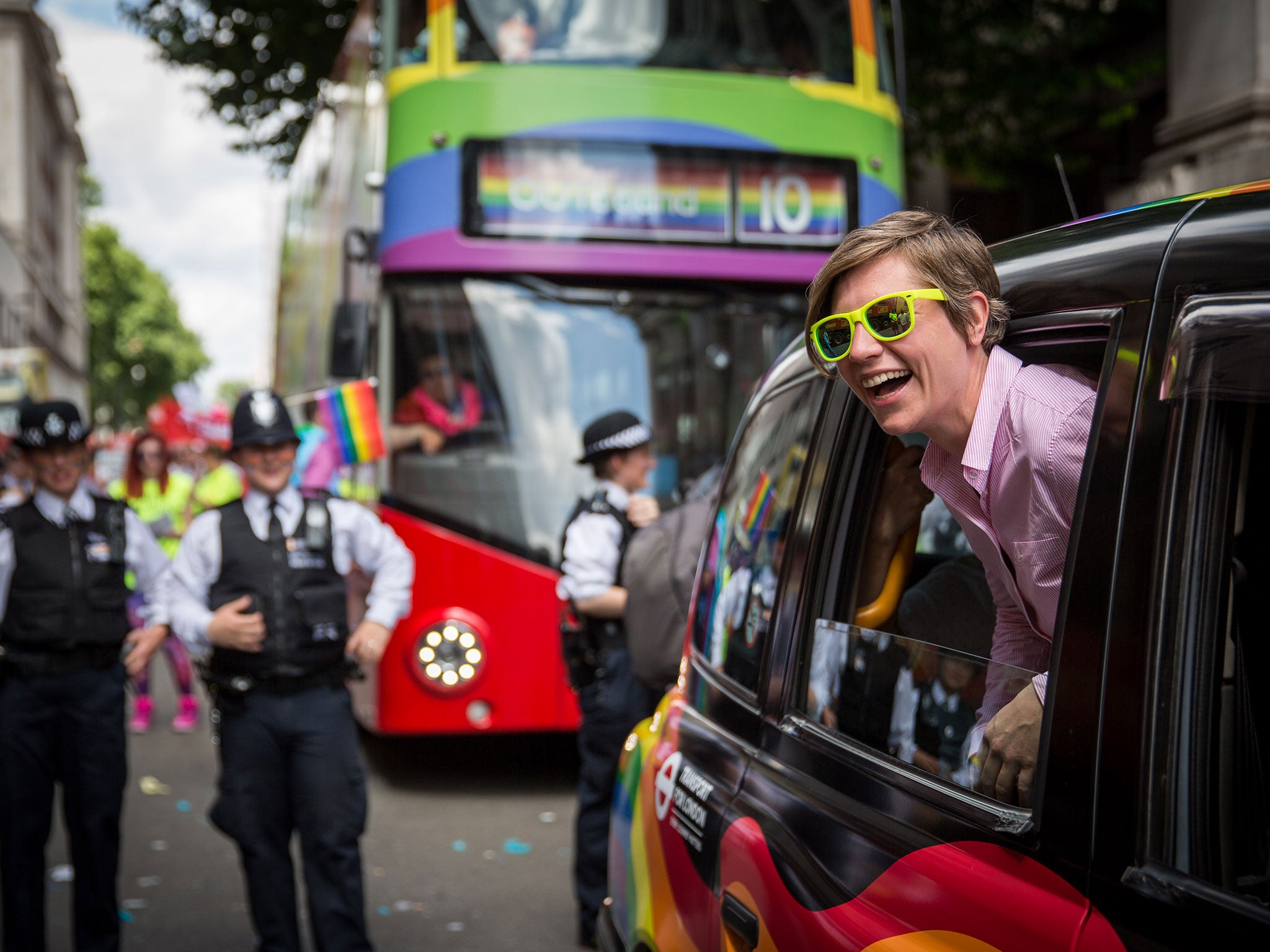 In a sign of solidarity with members of the LGBT community in other countries, flag bearers carried more than 200 international flags as they walked the route