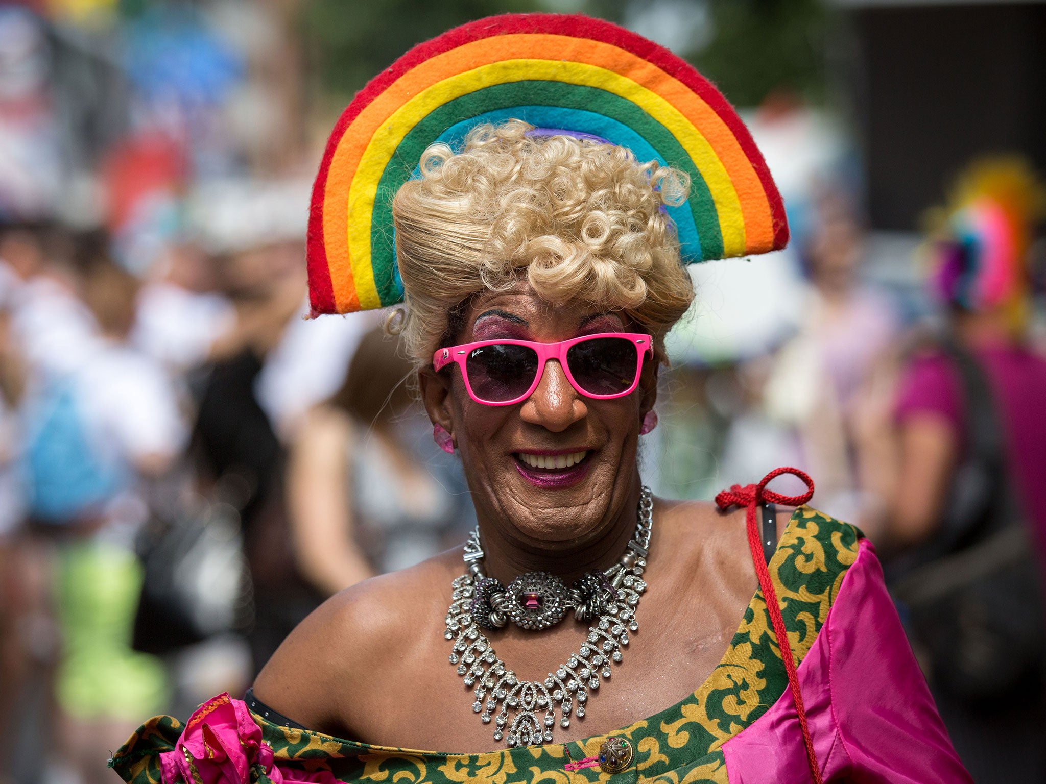 A member of the Lesbian, Gay, Bisexual and Transgender (LGBT) community takes part in the annual Pride Parade in London