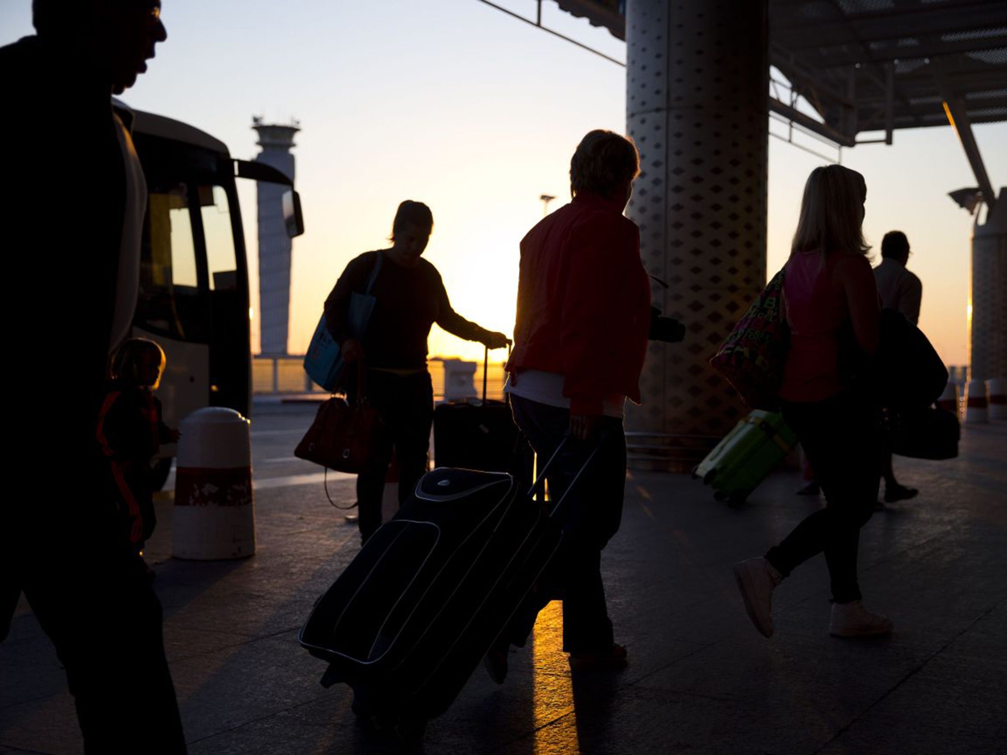 Tourists wait to leave Tunisia at Enfidha International Airport on Saturday