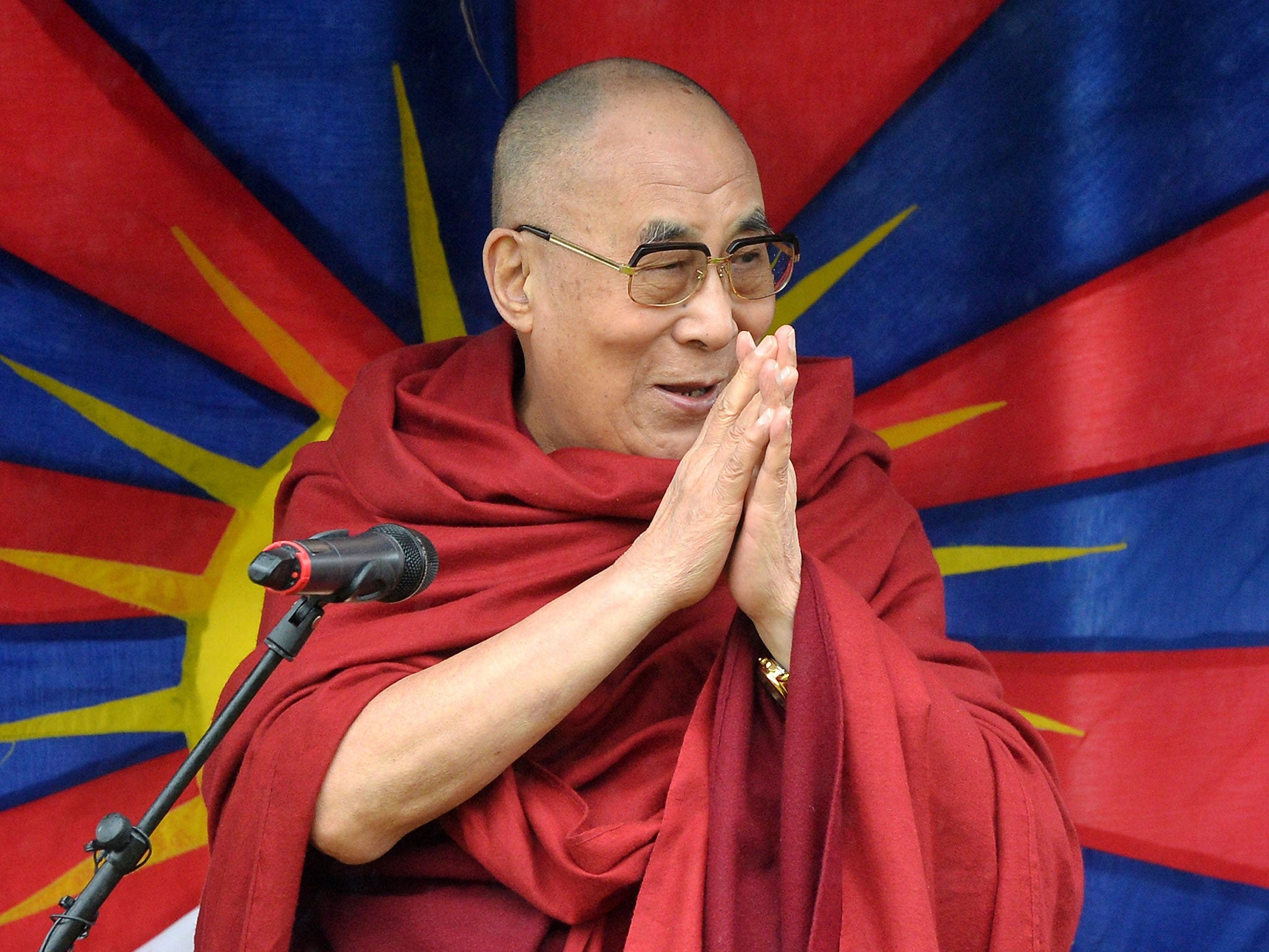 The Dalai Lama addresses an audience in the Stone Circle on the fifth day of Glastonbury Festival