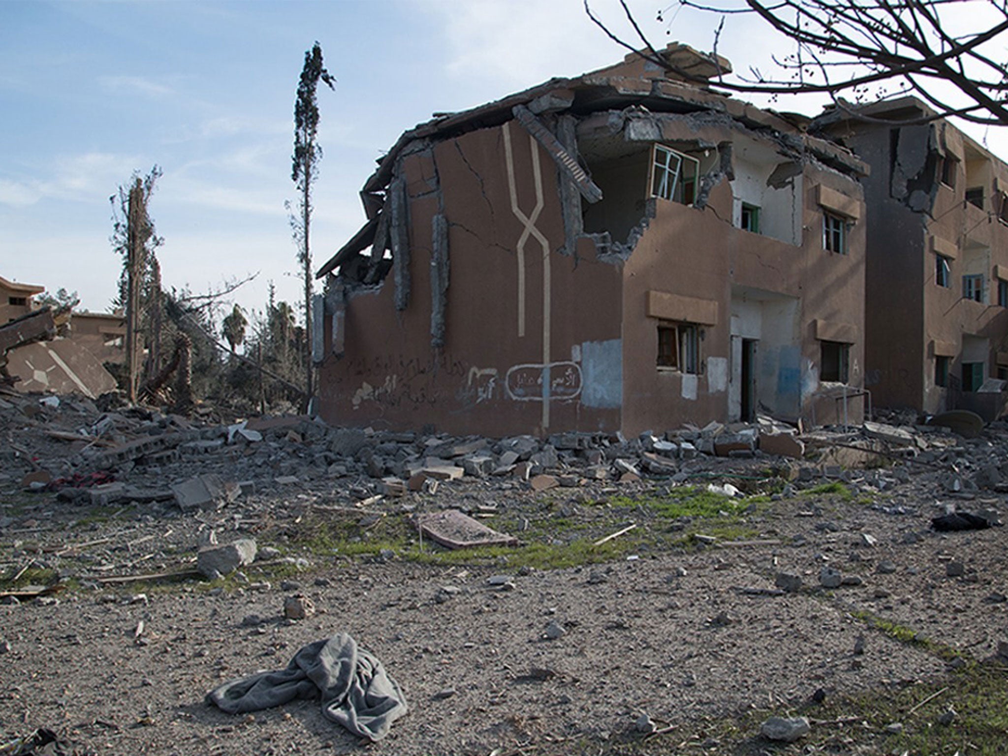 A still image posted by the Islamic state Raqqa branch on jihadist forums shows a heavily damaged building in Raqa after it was allegedly targeted by a US-led coalition air strike