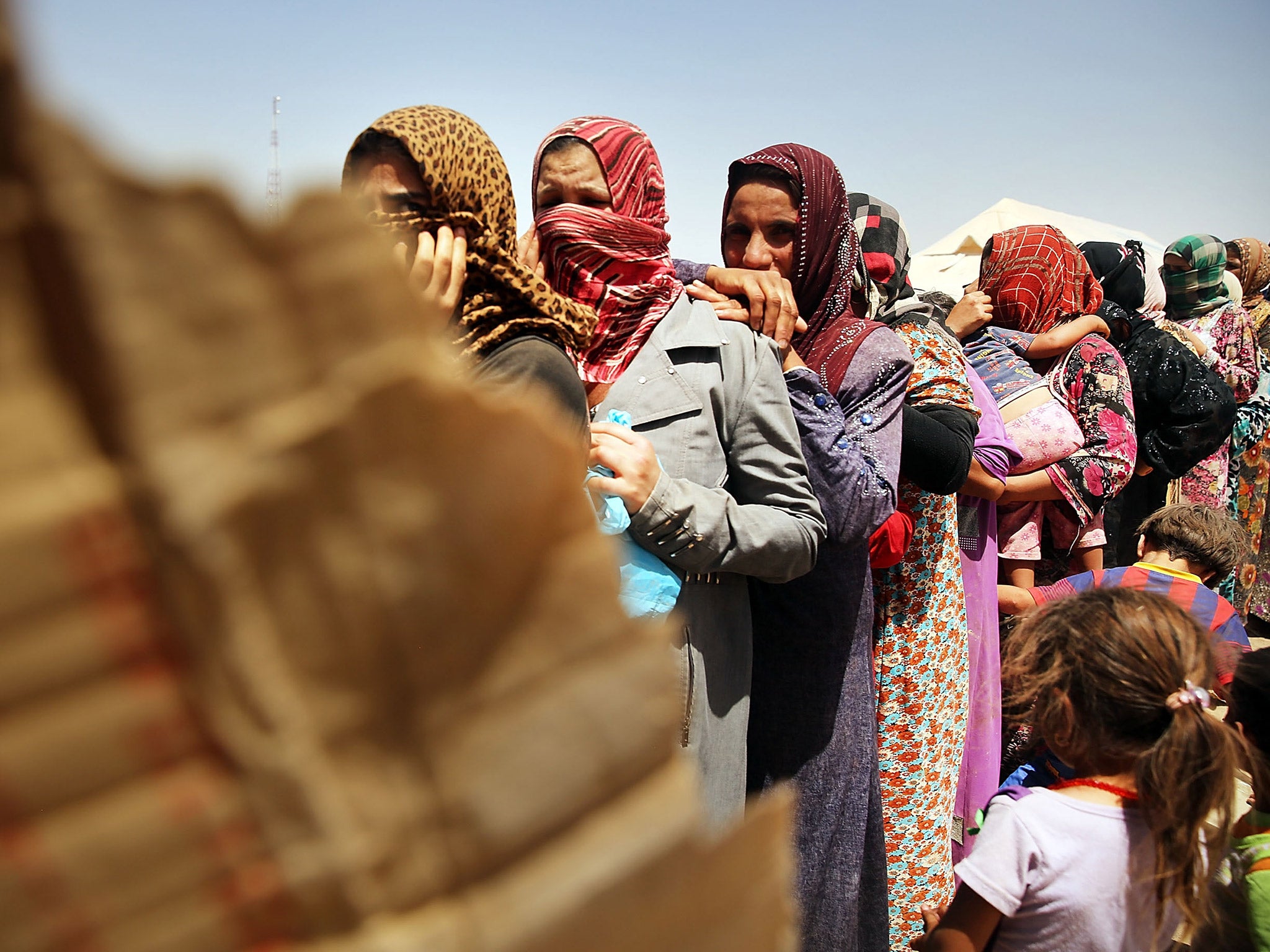 Thousands of people have fled areas of Iraq and Syria taken over by Isis