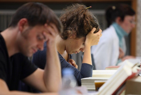 Students are so worried about their finances that they're finding it hard to concentrate in class (via Adam Berry/Getty Images)