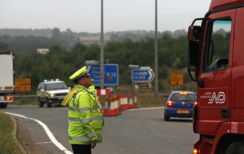 British police help to coordinate Operation Stack when Channel Tunnel is closed (AFP)