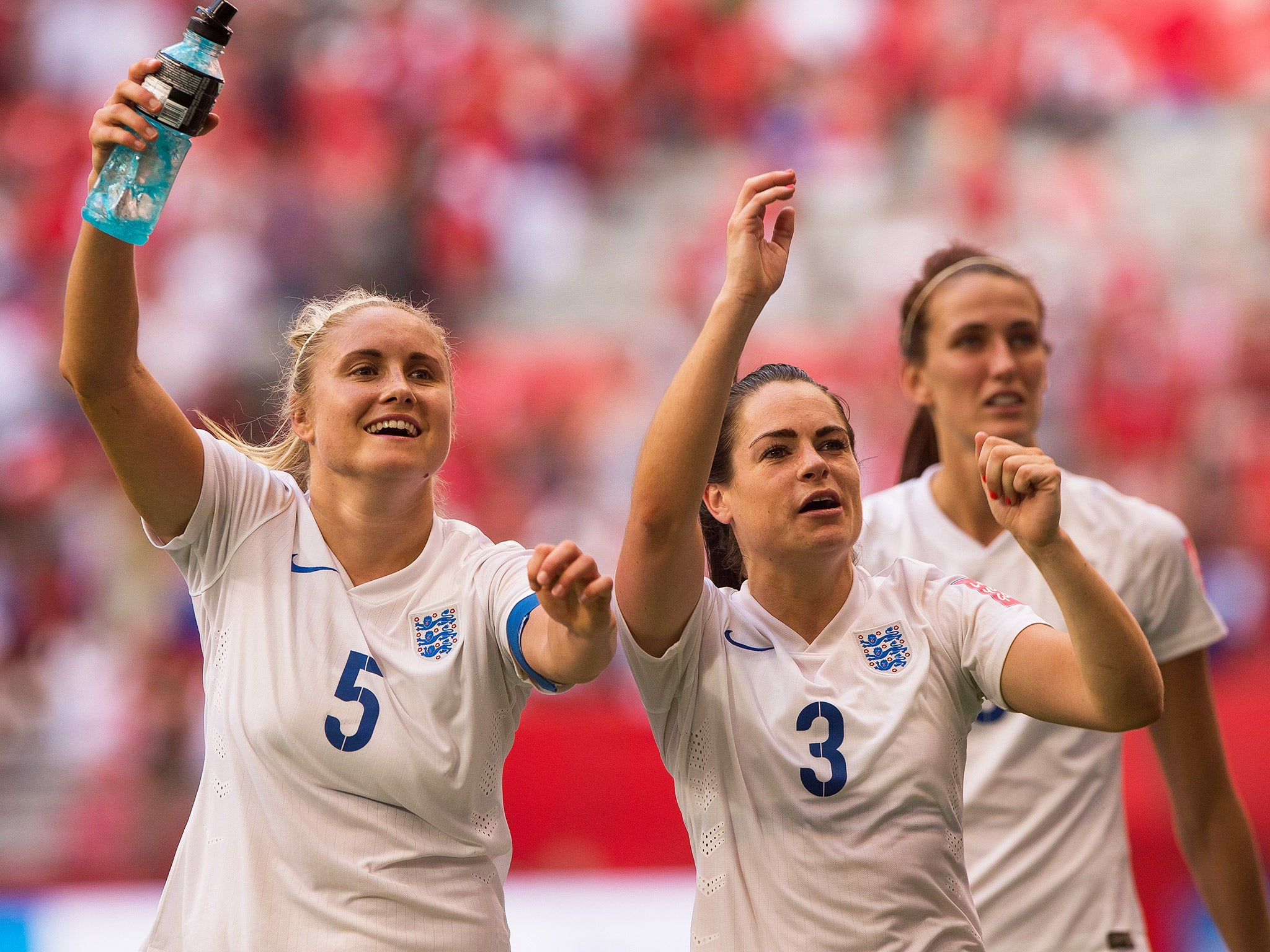 Steph Houghton and Claire Rafferty celebrate after England's victory over hosts Canada (Getty)