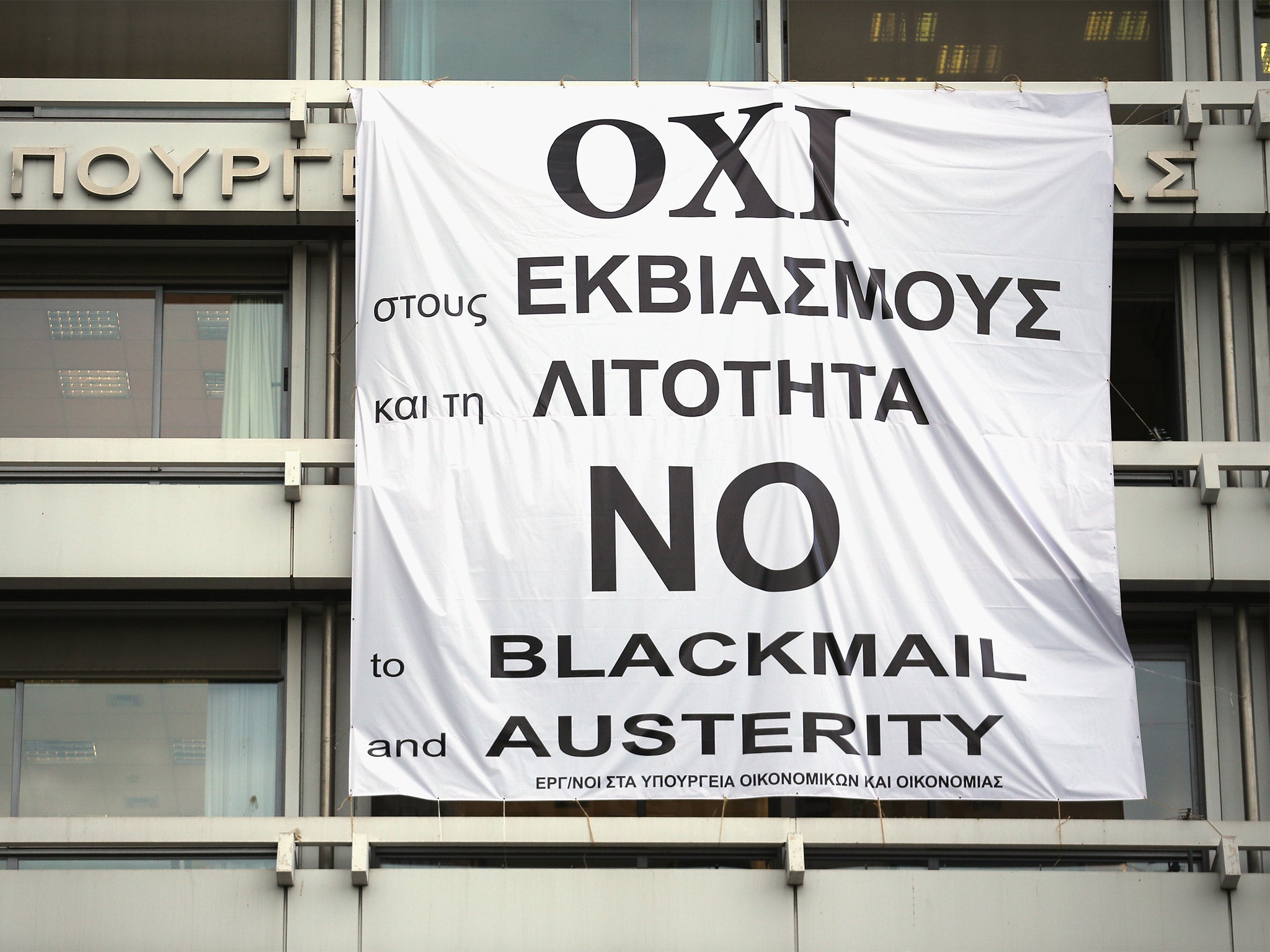 A banner supporting the NO vote in the upcoming referendum hangs from the offices of the Greek Finance Ministry on Wednesday (Getty)