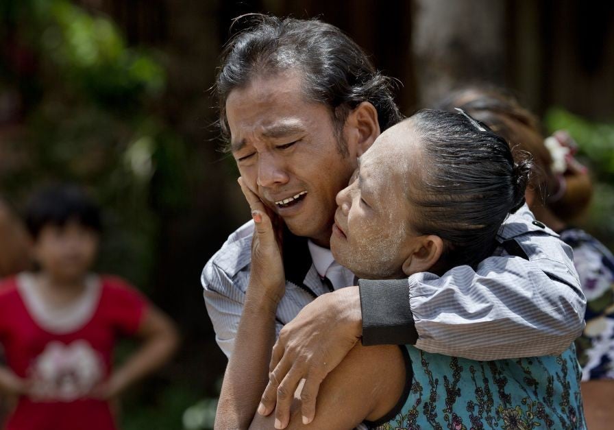 Myint Naing sees his mother Khin Than for the first time in 22 years, at his home village in southern Burma