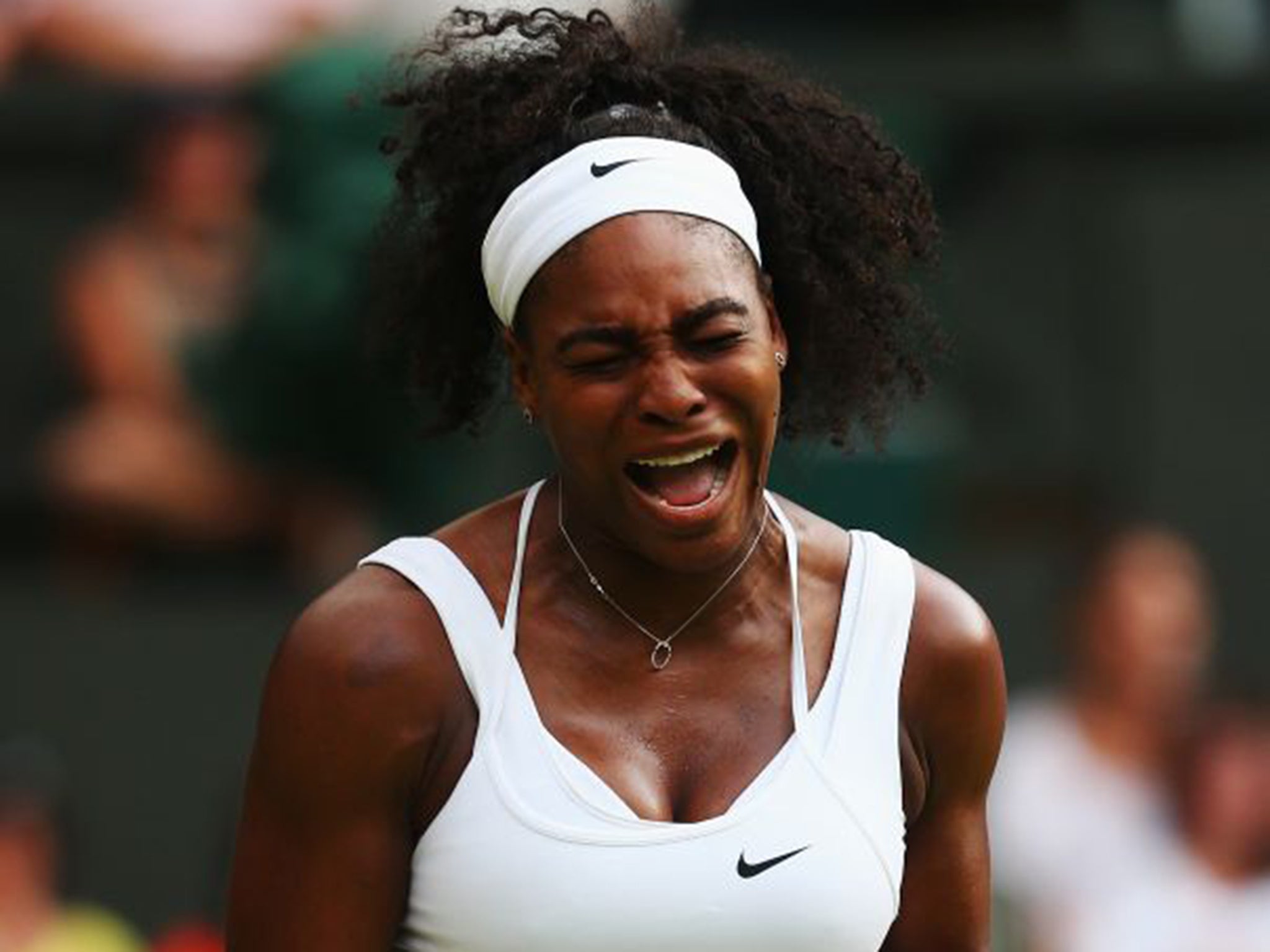 Serena Williams celebrates after her second-round victory over Timea Babos