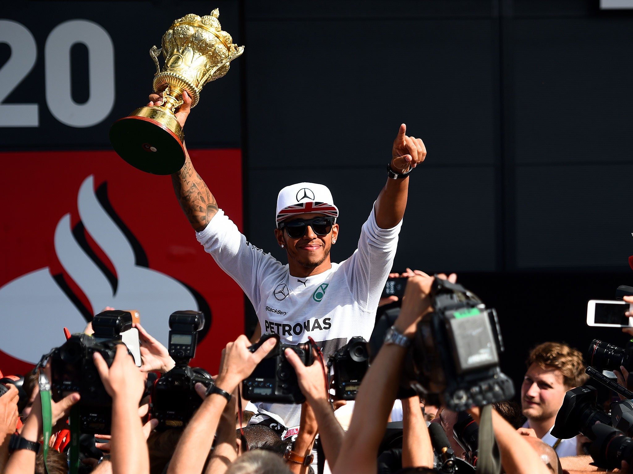 Lewis Hamilton celebrates winning last year's British Grand Prix