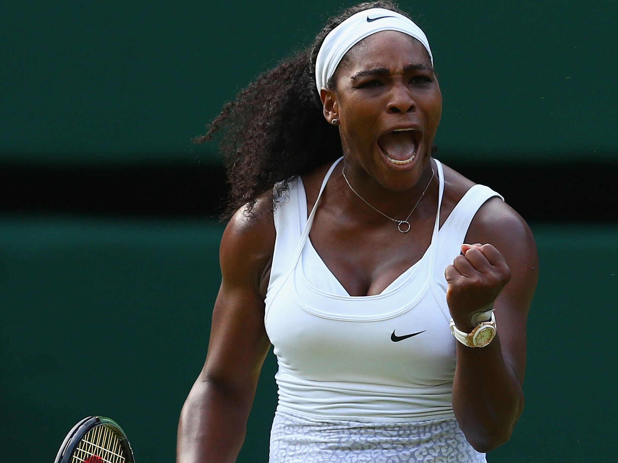 Serena Williams celebrates her triumph over Heather Watson