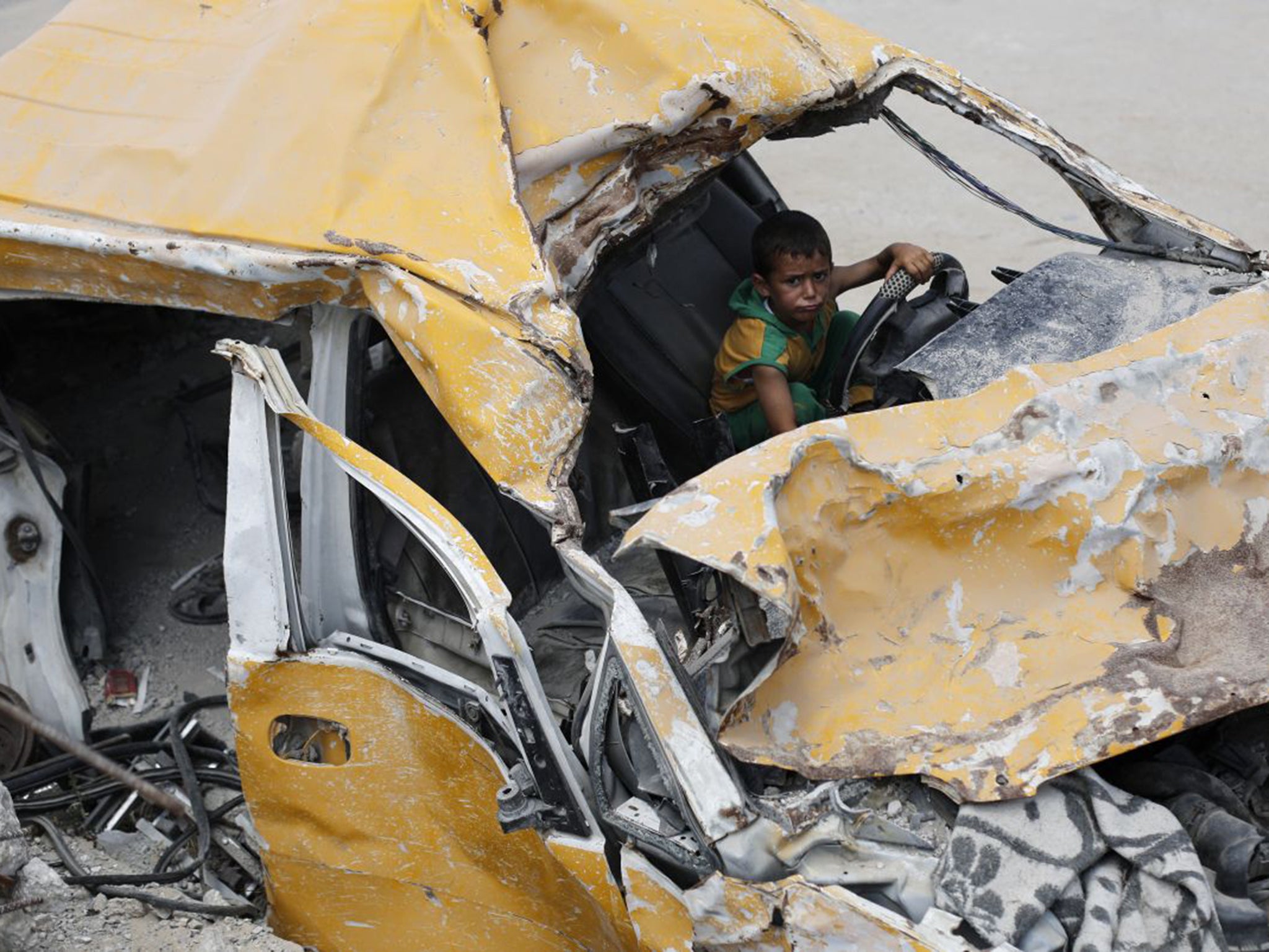 This Palestinian boy's home was destroyed during the 50-day war in the summer of 2014, in Khuza’a