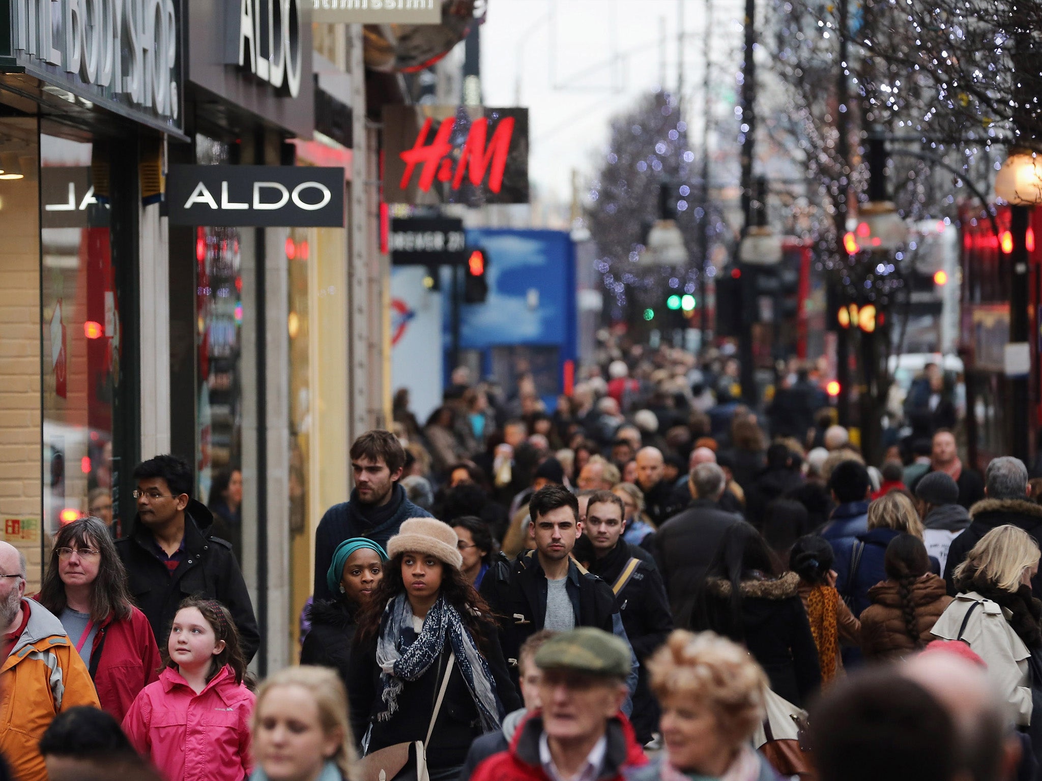 Shoppers make their way down Oxford Street on 24 December 2012 in London, England