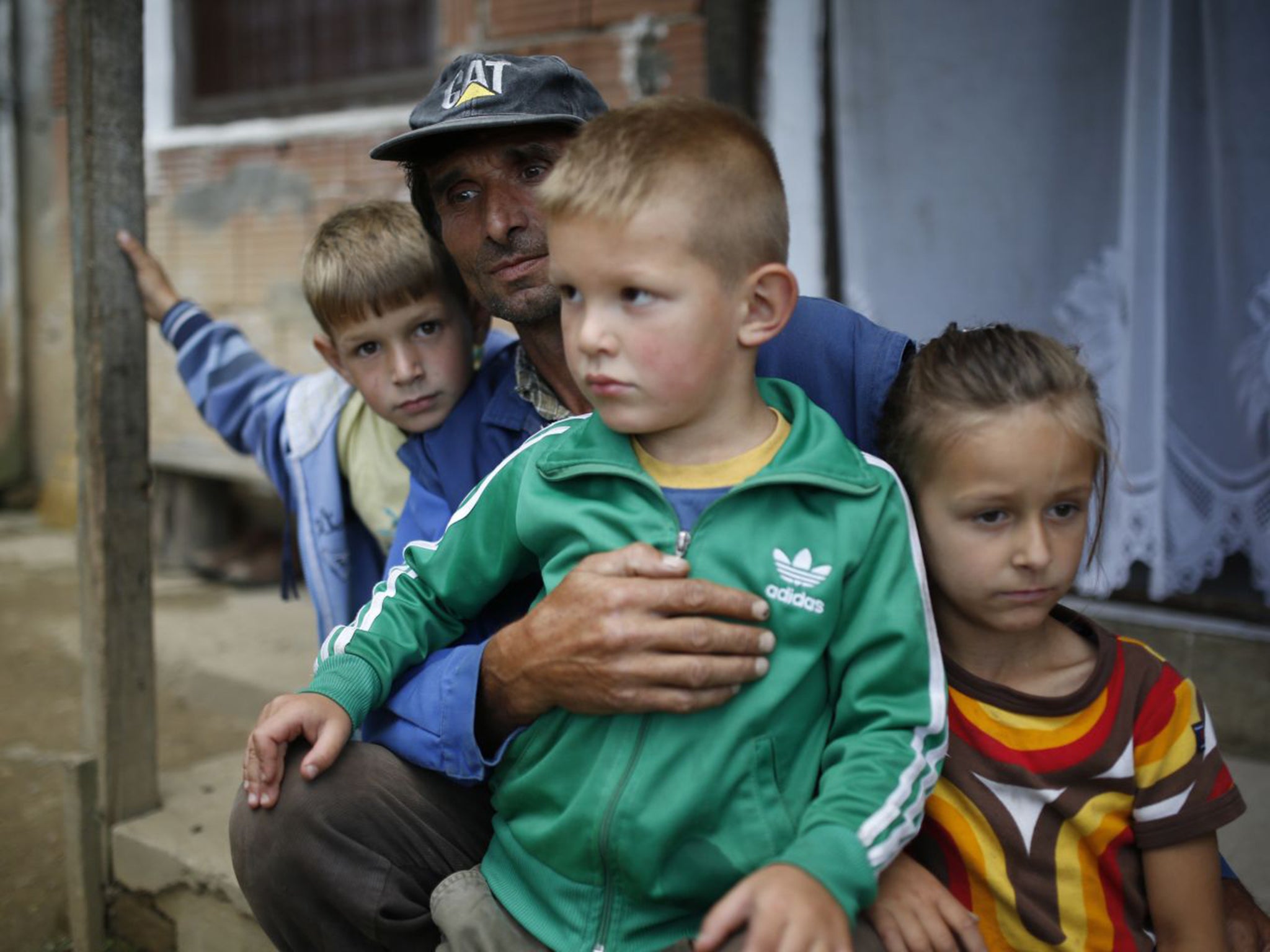 Ramiz Nukic with his grandchildren