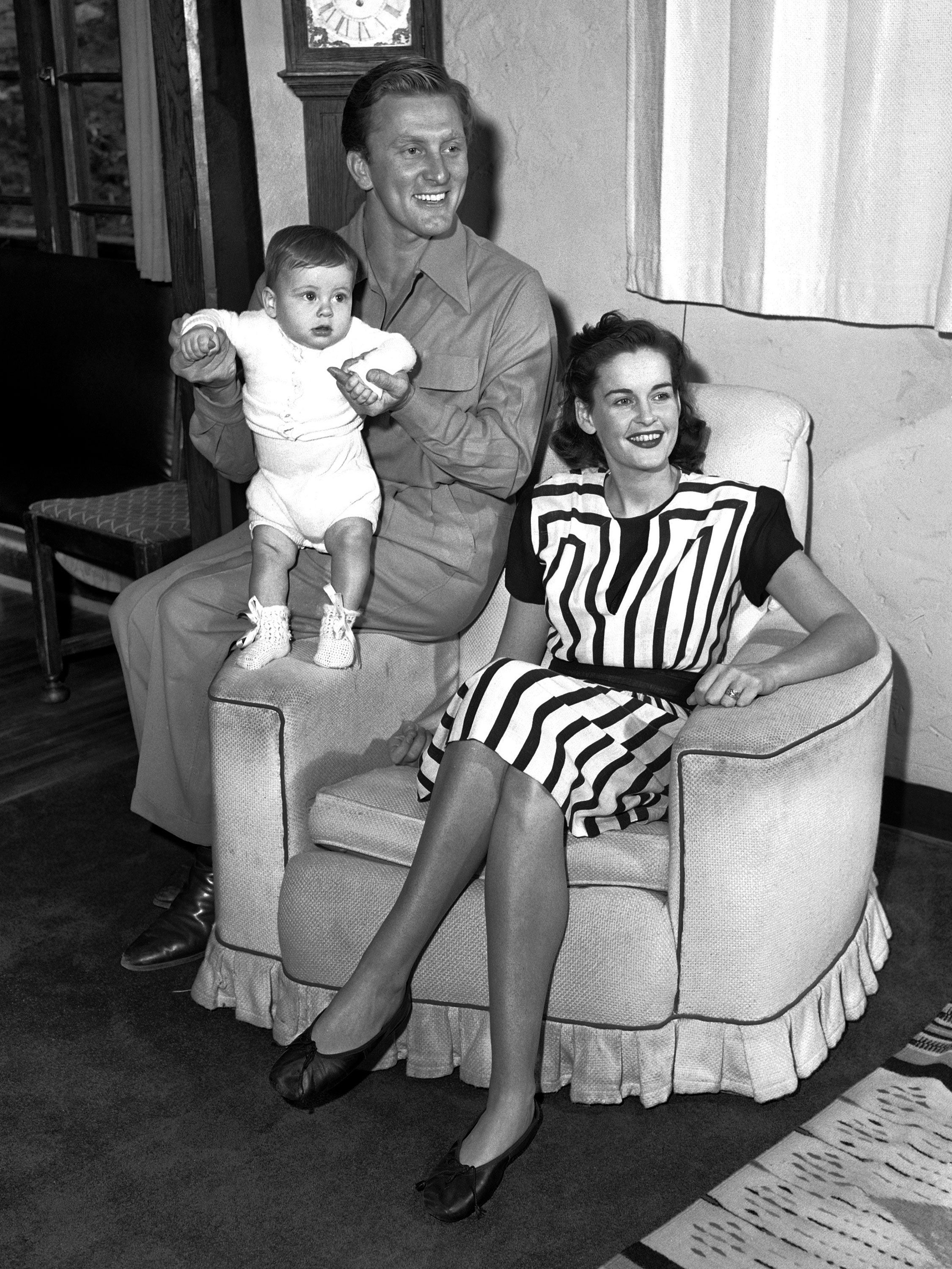 Kirk and Diana Douglas pose with their second son, Joel, in 1947