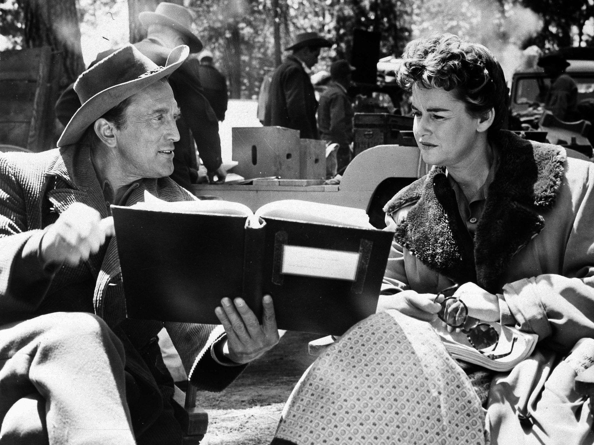 Kirk Douglas and his former wife, Diana Douglas, go over their lines for a scene in 'The Indian Fighter'