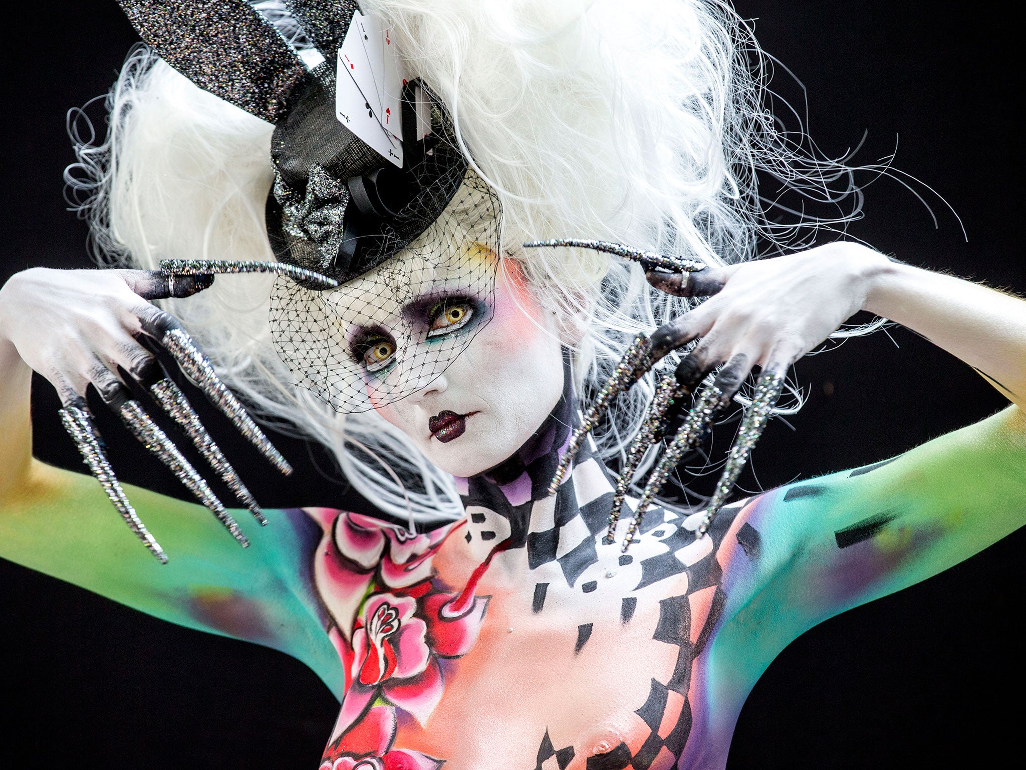 Model poses in a glamourous gothic design during the World Bodypainting Festival in Austria