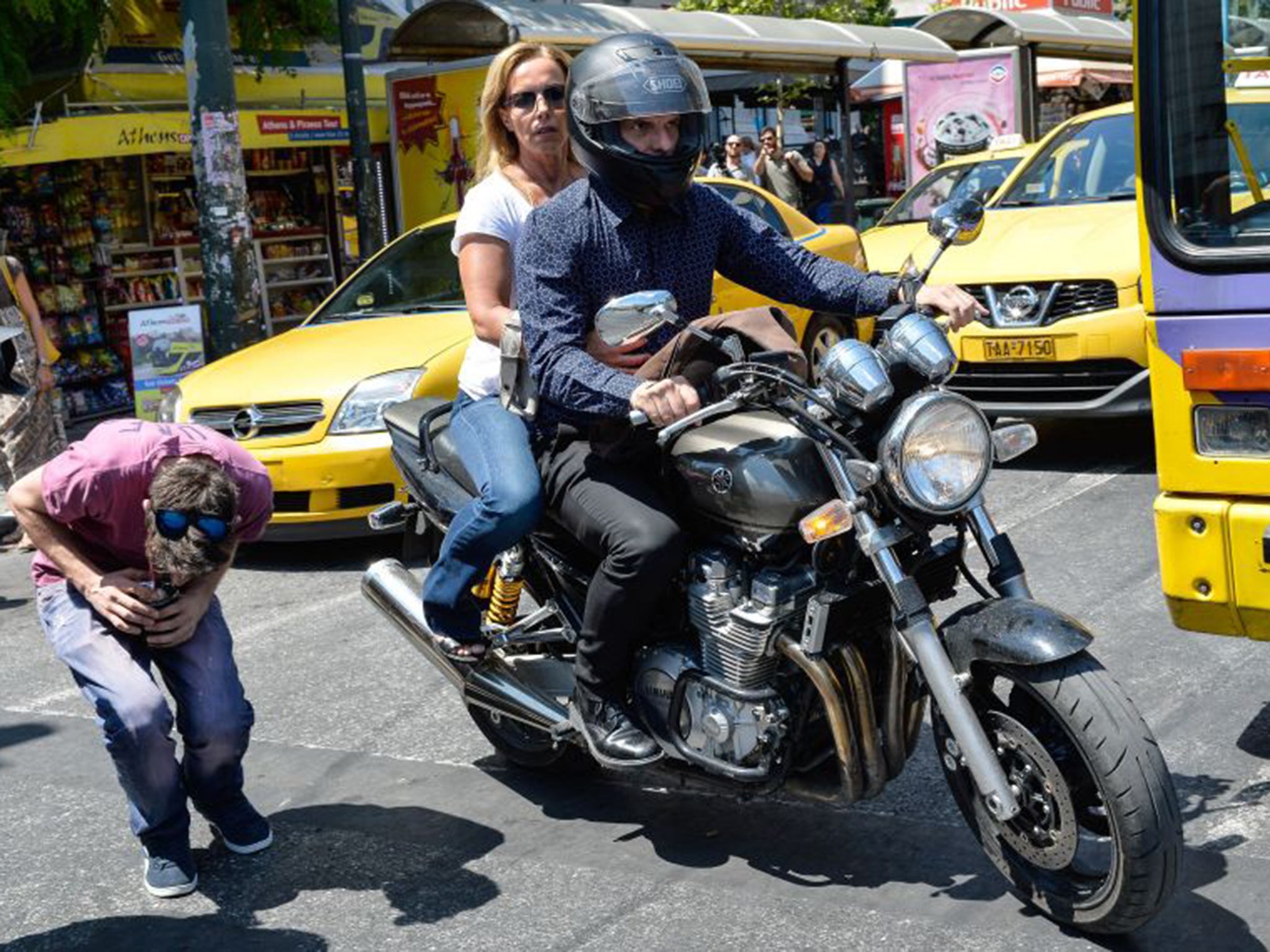 Yanis Varoufakis leaving the Ministry of Finance on Monday with his wife Danai