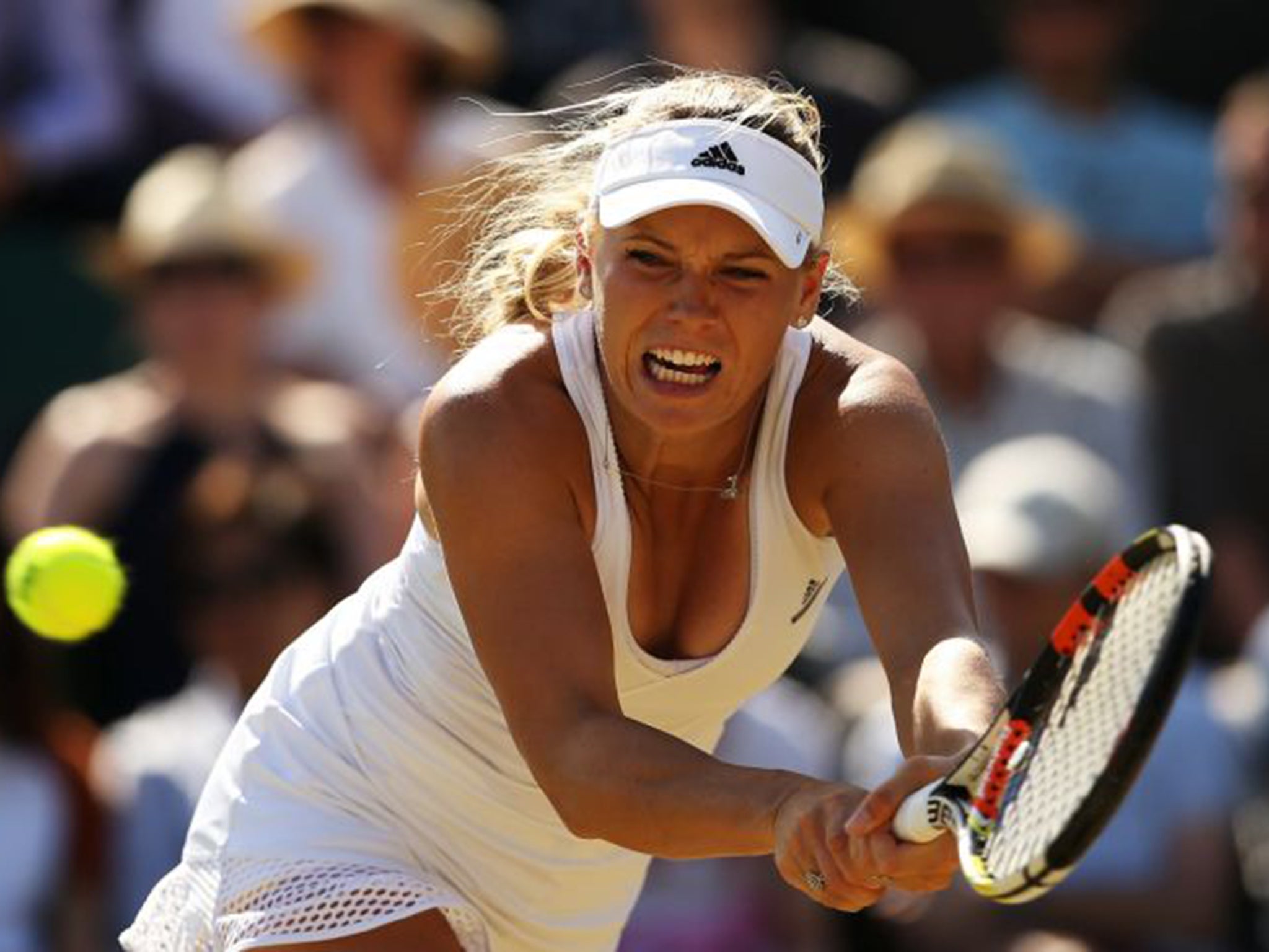 Caroline Wozniacki on her way to defeat against Garbine Muguruza