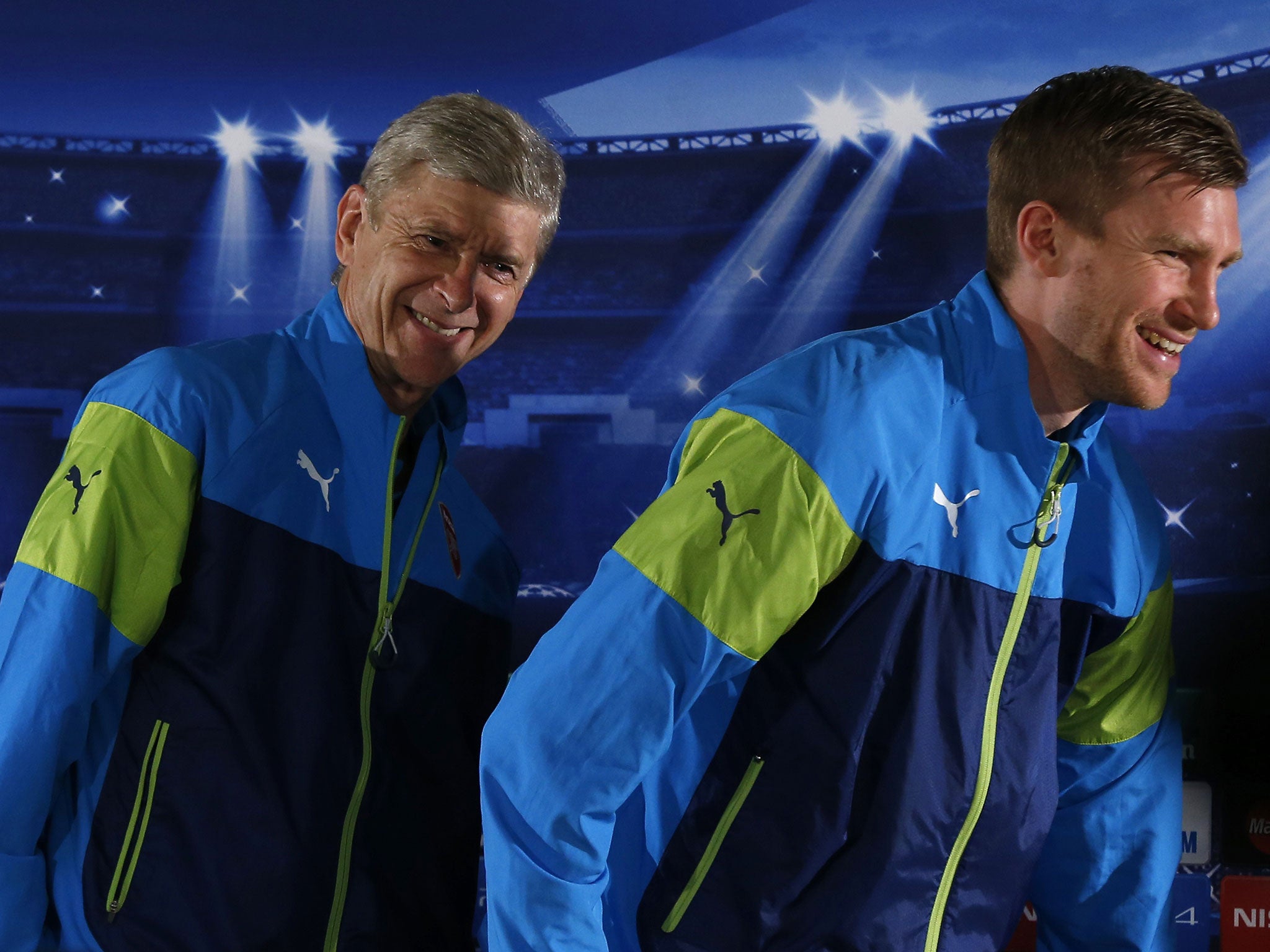 Arsene Wenger and Per Mertesacker