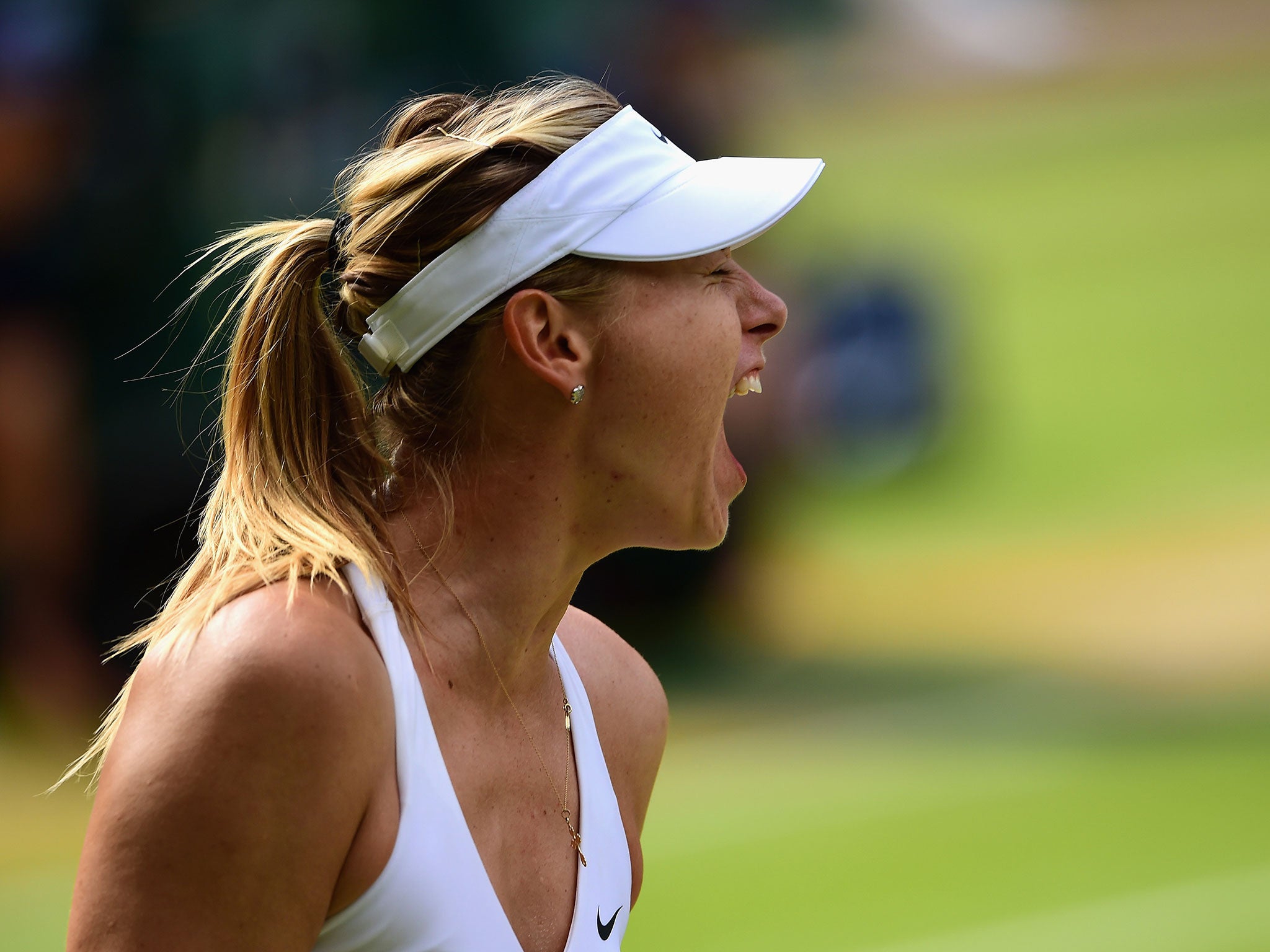 Maria Sharapova celebrates after coming through her tough quarter-final match against Coco Vandeweghe