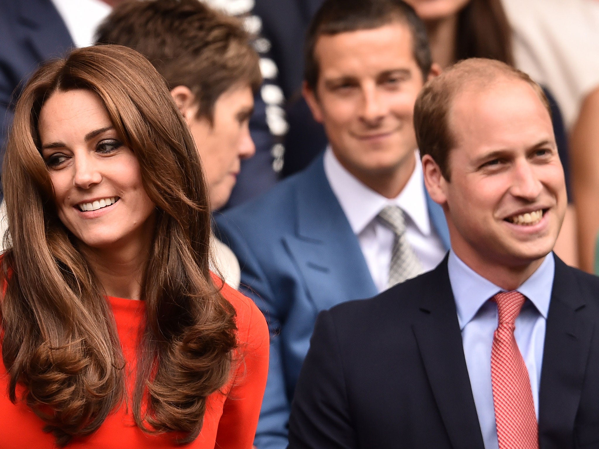 The Duchess and Duke of Cambridge look on