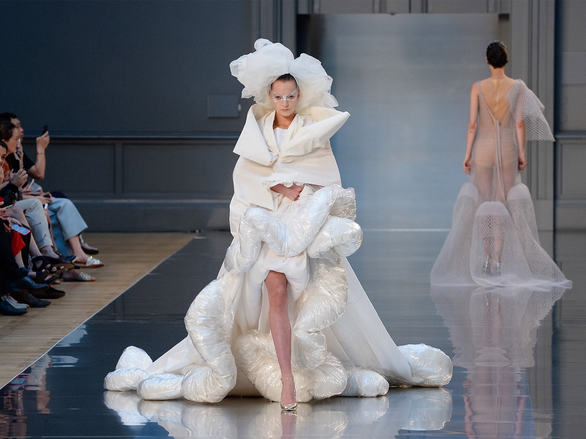 Models walk the runway during the Maison Margiela show