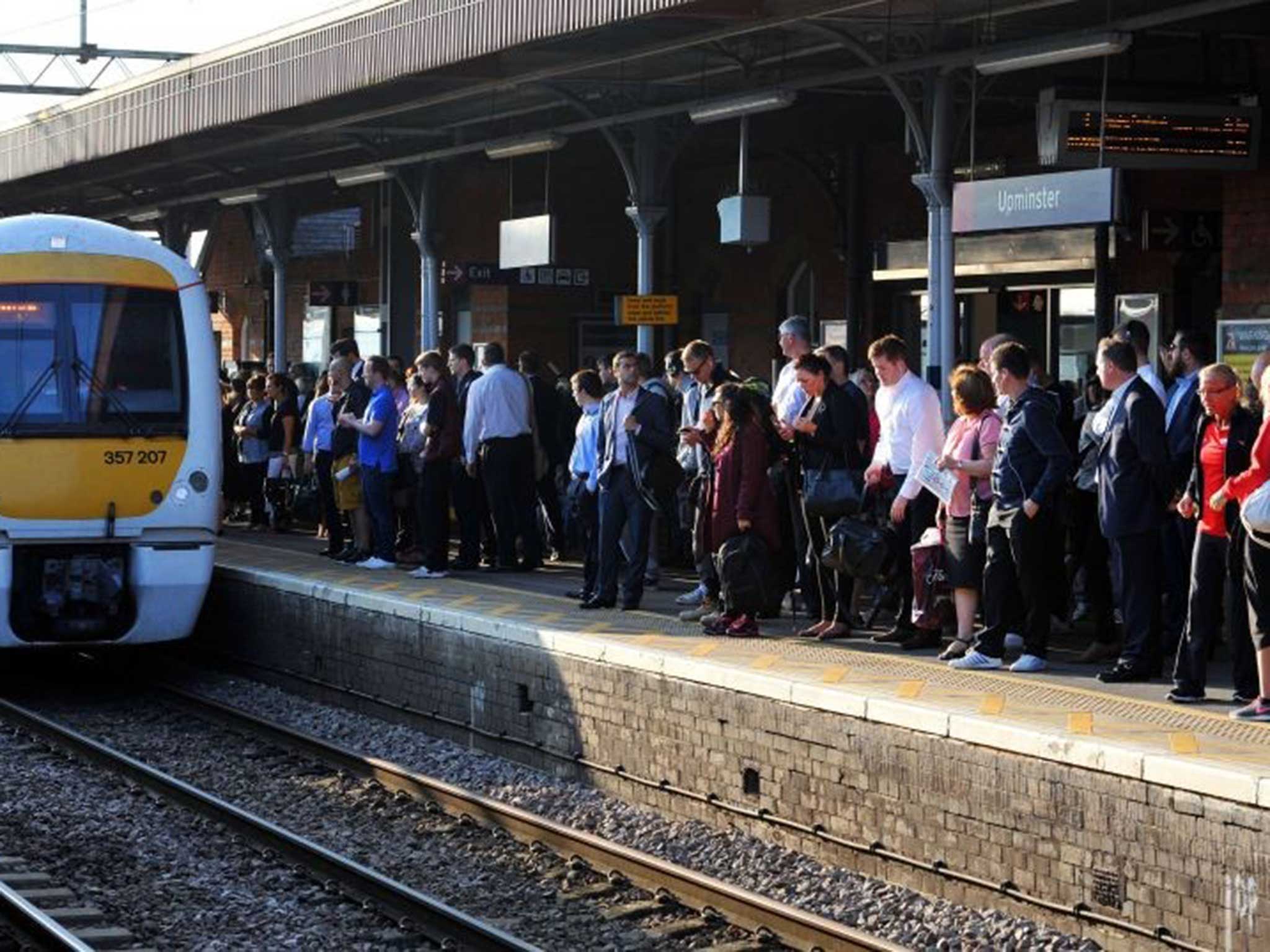 Travellers wait at Upminister