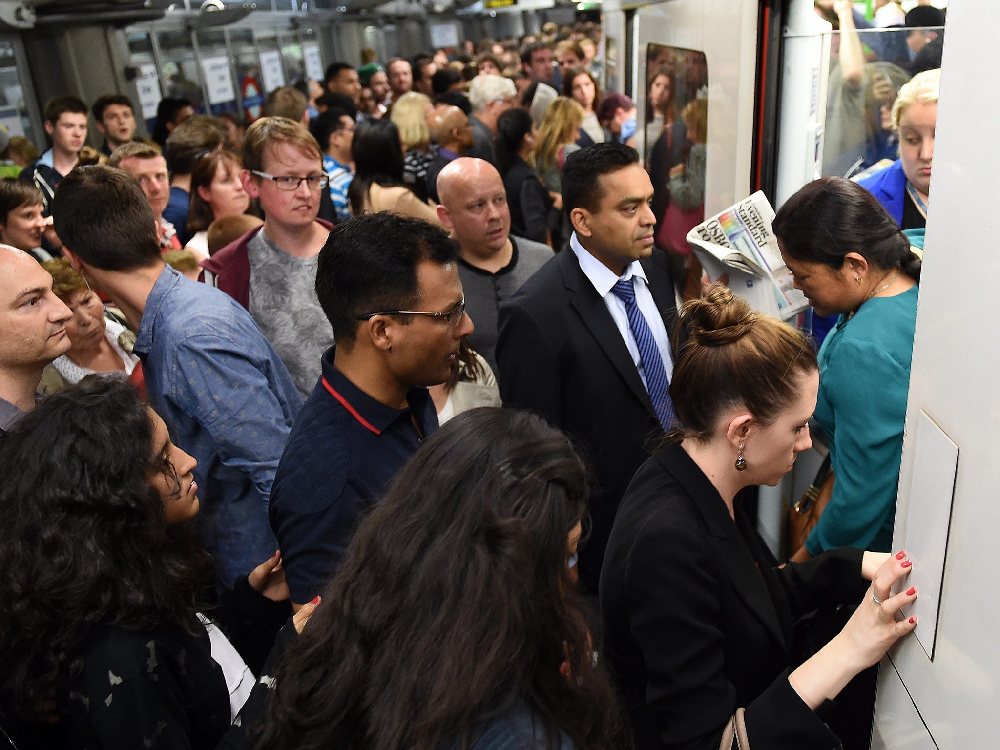 Commuters attempt to board a train at Westminster during the last strike in July