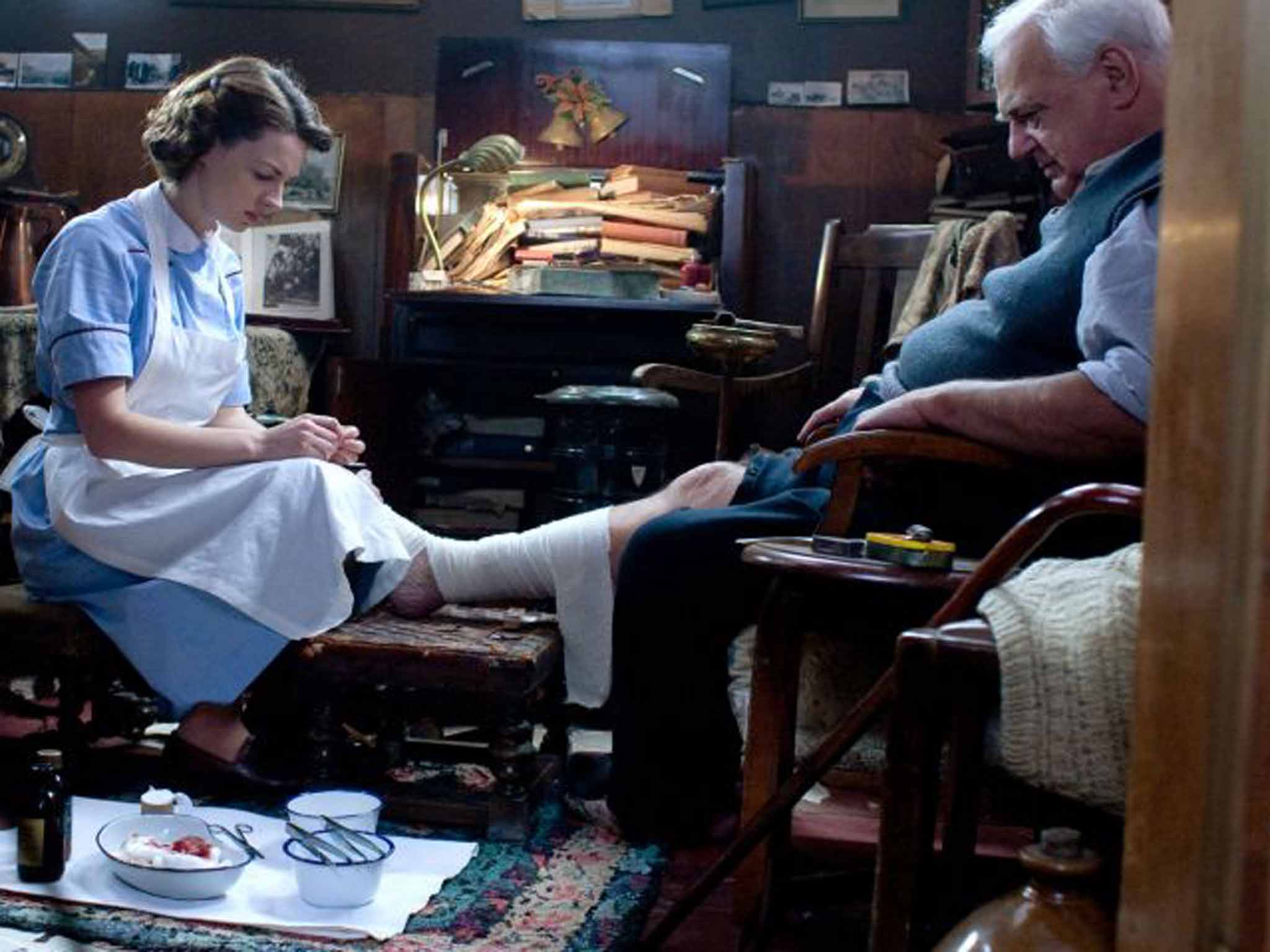 Tending to a former soldier after being given district nursing duties in 'Call the Midwife'