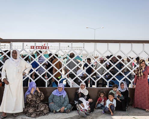 Syrian refugees on the border with Turkey