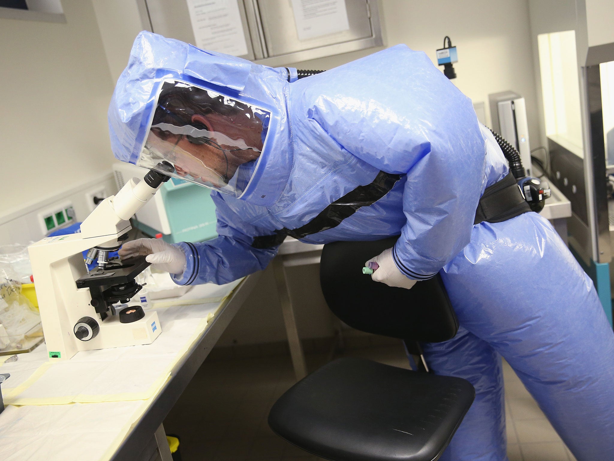 A doctor wearing an isolation suit during a demonstration of Ebola treatment capabilities