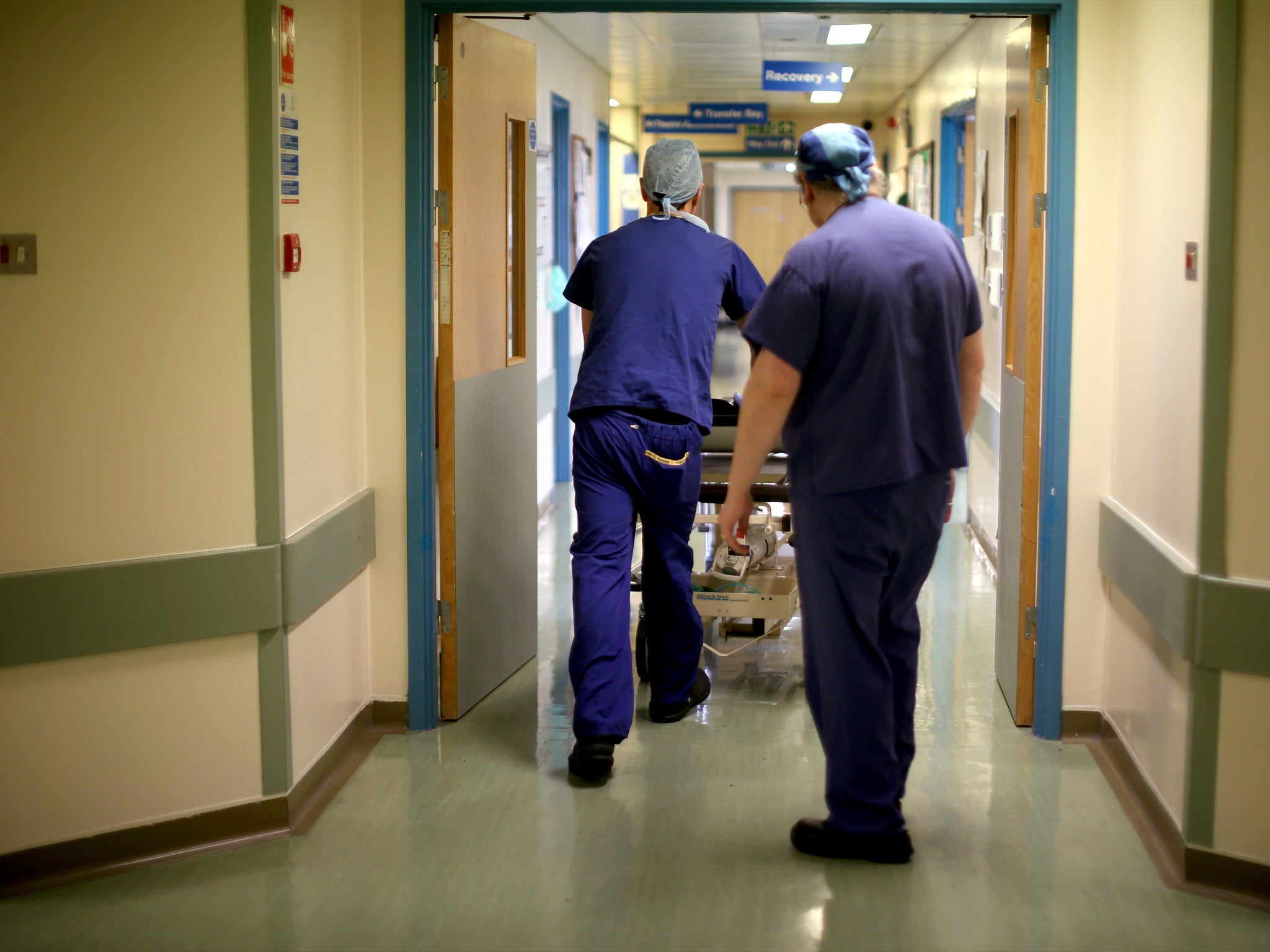 Theatre staff prepare to go in the operating theatre at Birmingham Women's Hospital on 22 January 2015 in Birmingham, England