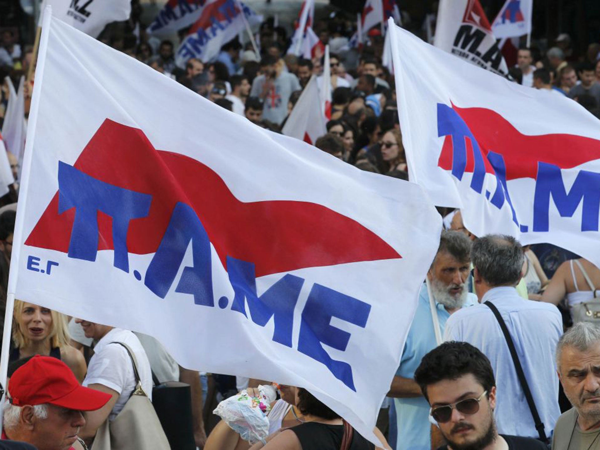 Protesters from the Communist-affiliated trade union PAME attend an anti-austerity rally in central Athens