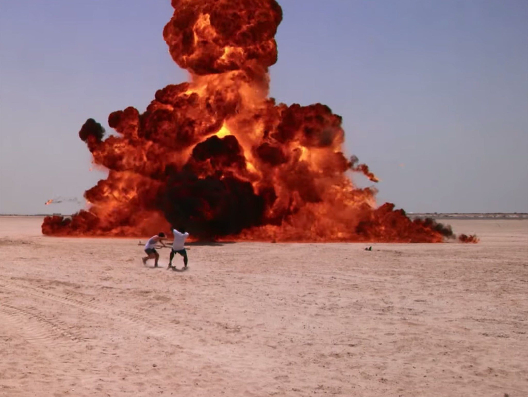 An explosion from Star Wars: The Force Awakens with Daisy Ridley and John Boyega