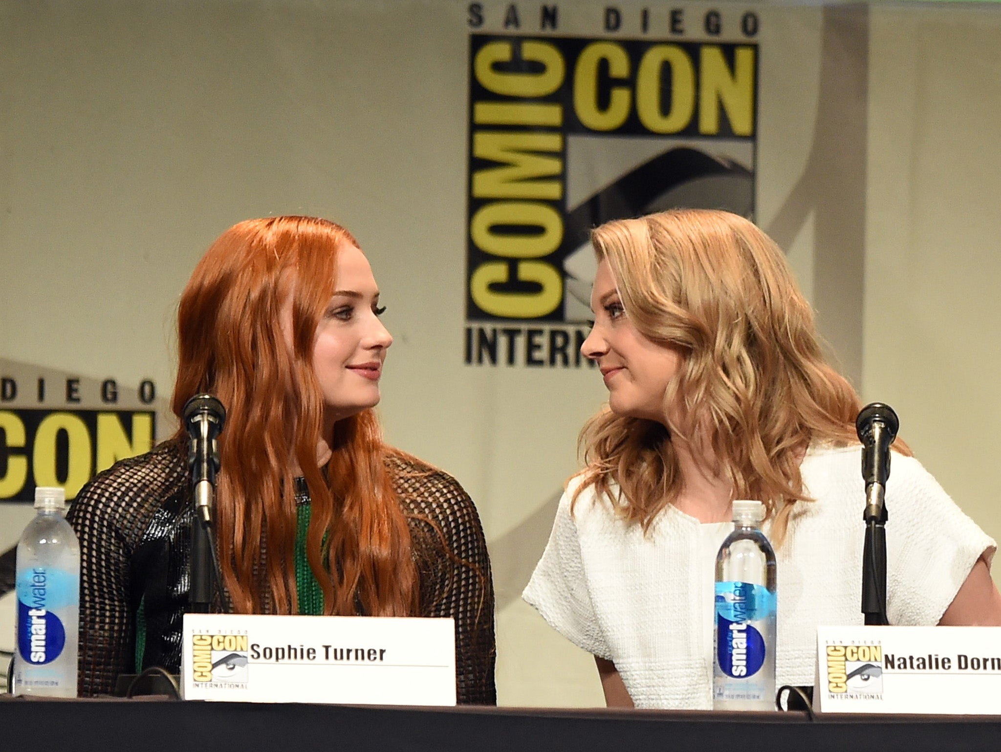 Sophie Turner (L) and Natalie Dormer onstage at the 'Game of Thrones' Comic Con