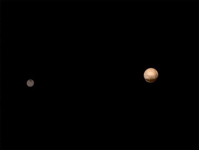 Pluto (R) and its moon Charon are pictured from about 6 million kilometers in this July 8, 2015 NASA handout photo from the New Horizons Long Range Reconnaissance Imager