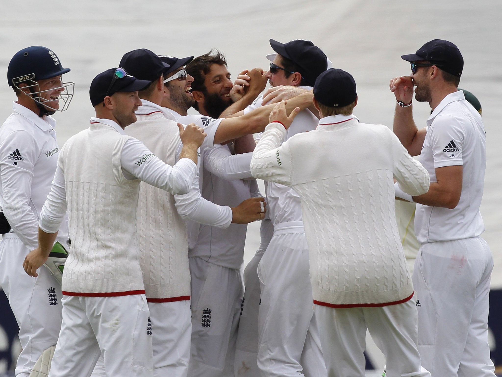 England celebrate the wicket of Haddin