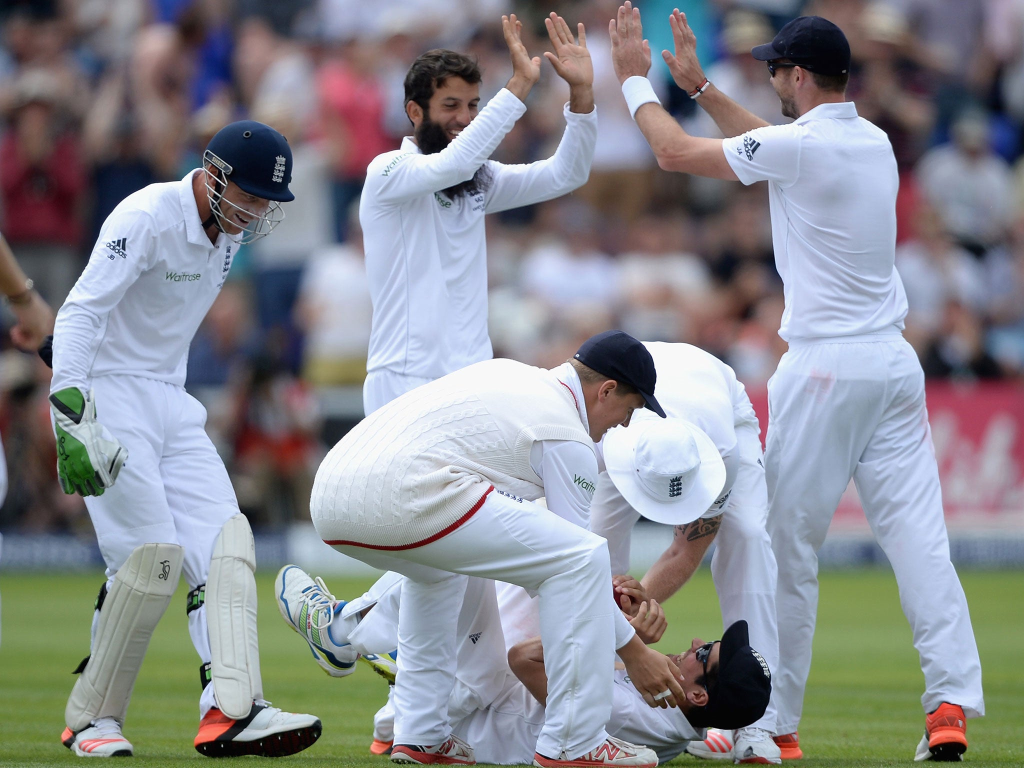 Moeen Ali celebrates following Cook's brilliant catch