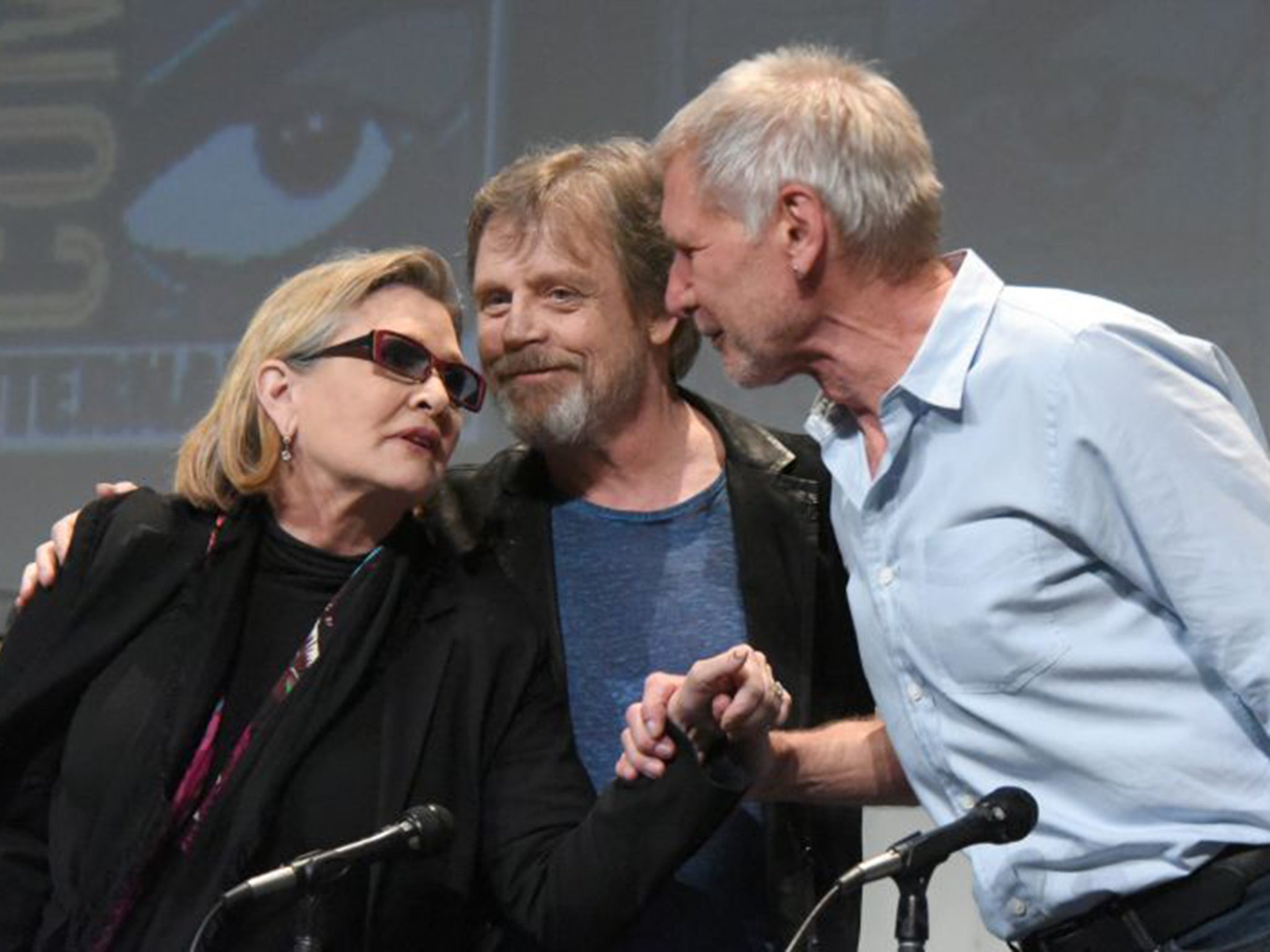 Harrison Ford joined Mark Hamill and Carrie Fisher to promote the new Star Wars film, scheduled for release in December