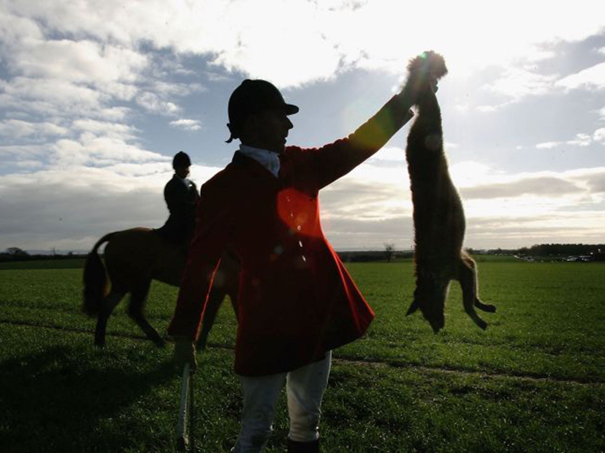 Fox hunters in traditional dress