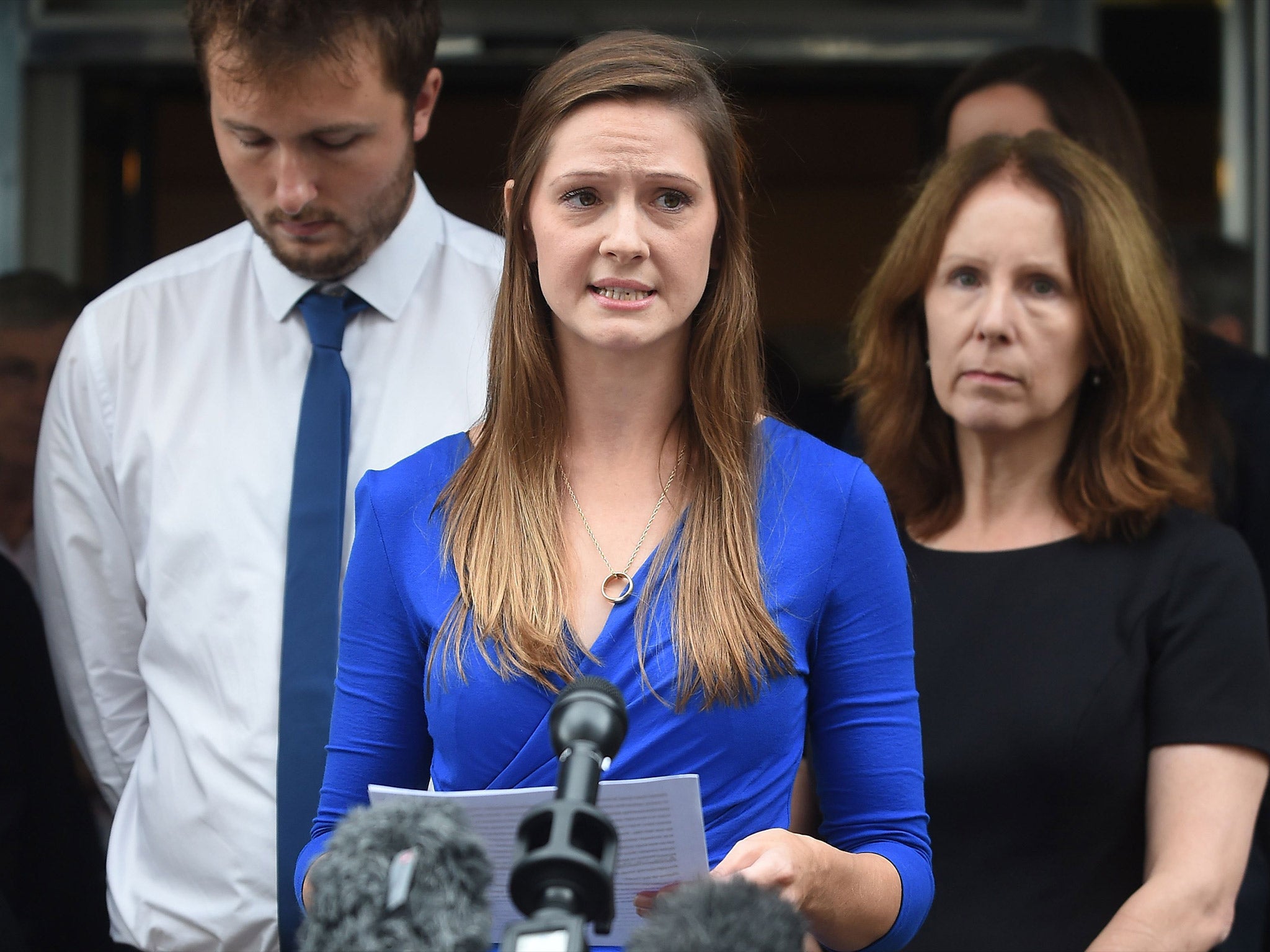 The widow of Corporal James Dunsby, Bryher Dunsby, reads a statement outside the Civic Suite in Solihull