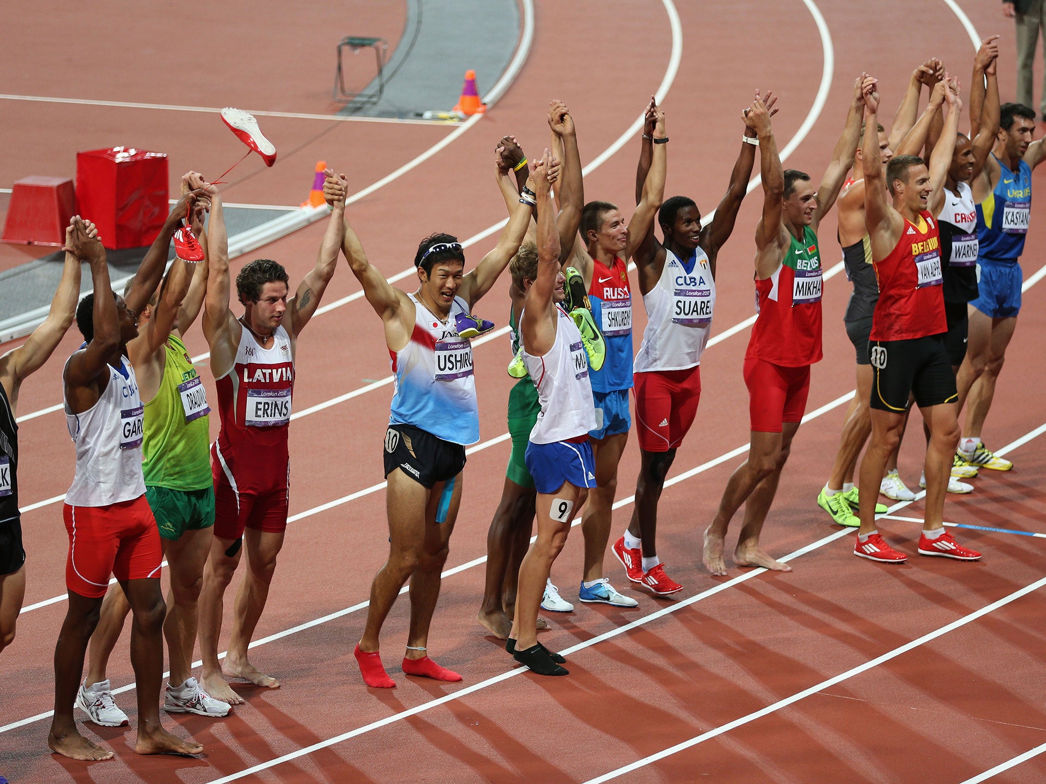 The male athletes celebrate after the Decathlon 1500m on Day 13 of the London 2012 Olympic Games