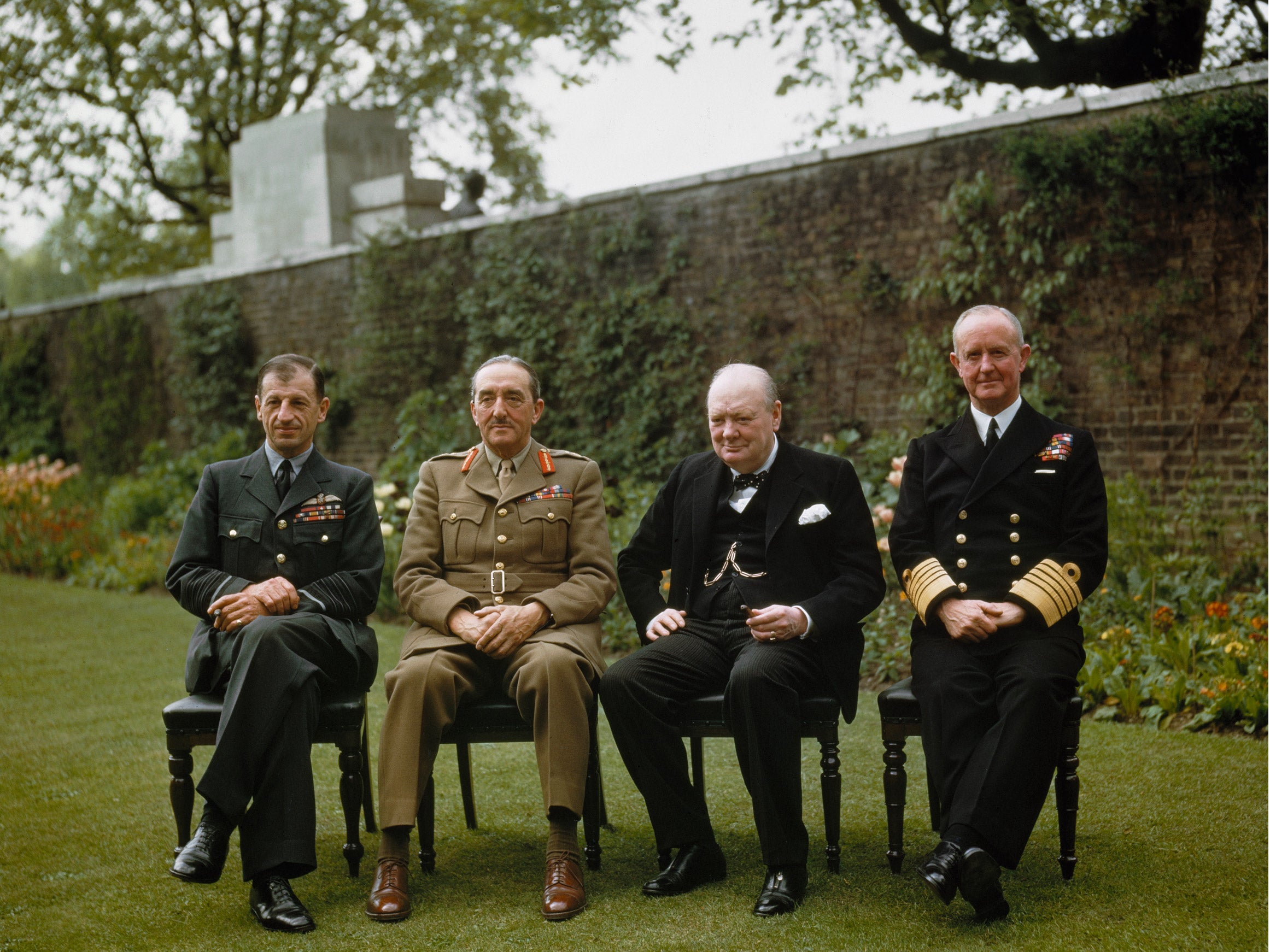 Left to right: Air Chief Marshal Sir Charles Portal; Field Marshal Sir Alan Brooke; Winston Churchill, the Prime Minister; and Admiral Sir Andrew Cunningham in 10 Downing Street Garden, 7 May 1945