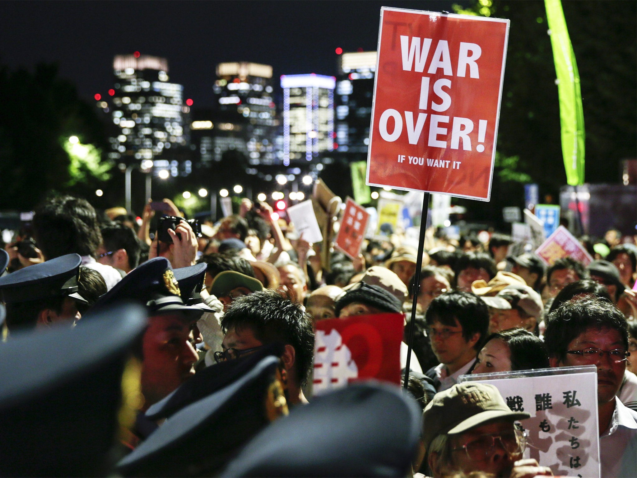 Protesters outside Japan’s parliament in Tokyo