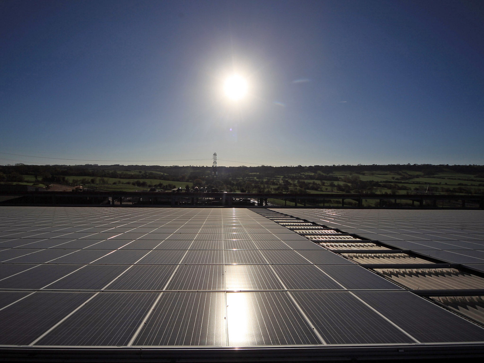 The sun shines on a solar panel system at Worthy Farm in Glastonbury (Getty)