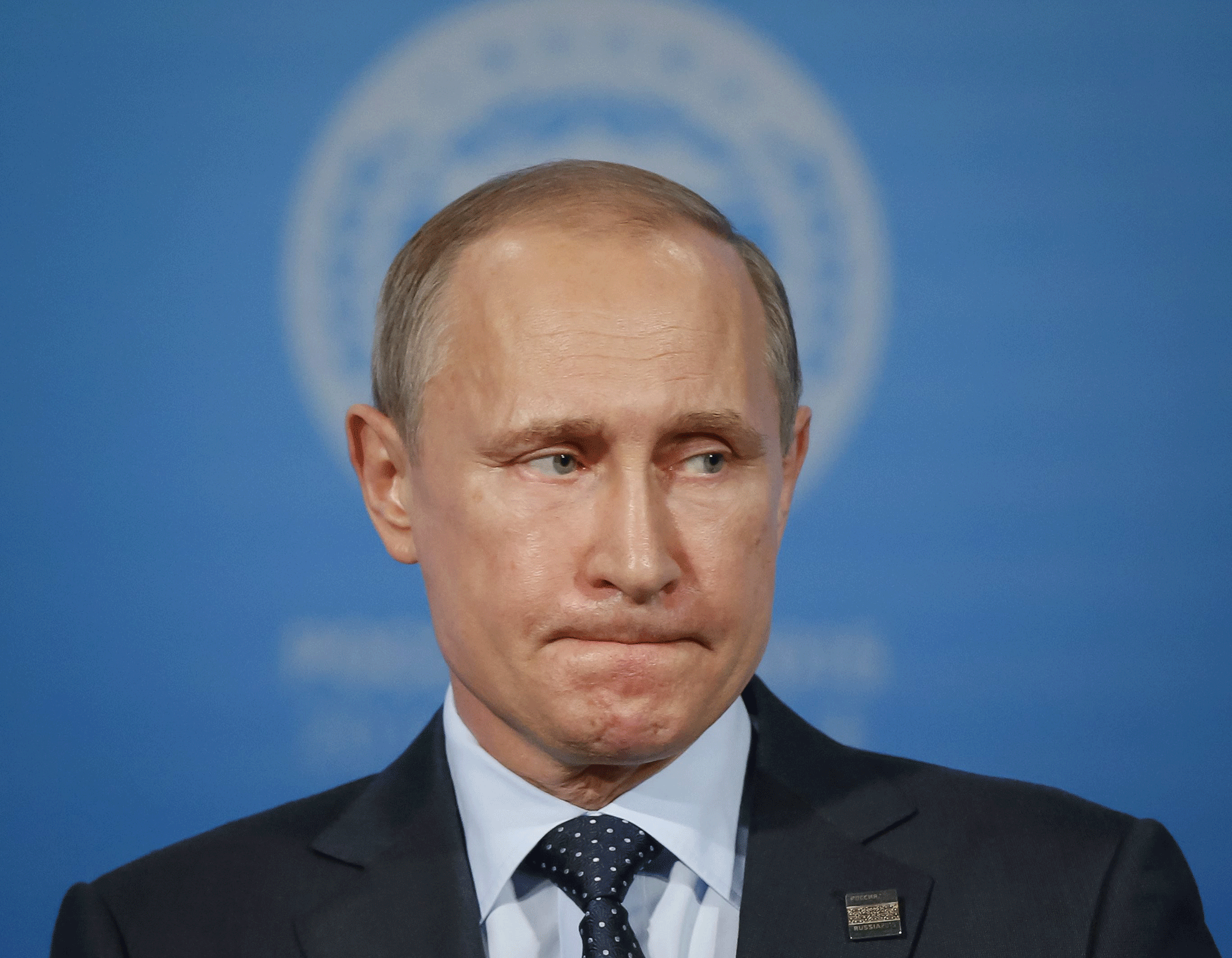 Vladimir Putin looks on at a news conference after the Shanghai Cooperation Organization (SCO) summit in Ufa, Russia, July 10, 2015