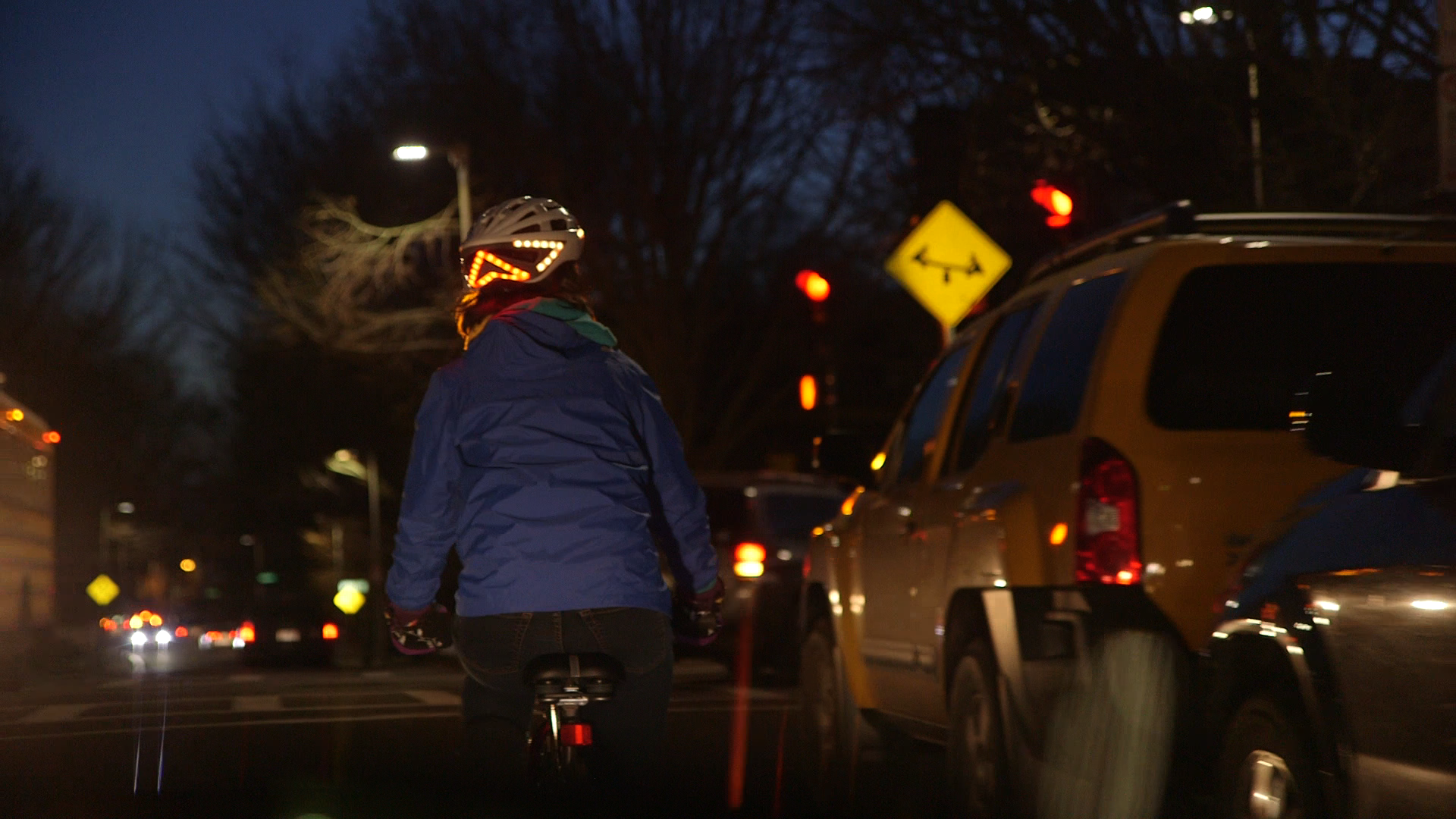 Lights on the back of the helmet make the cyclist's direction of travel easier to see at night